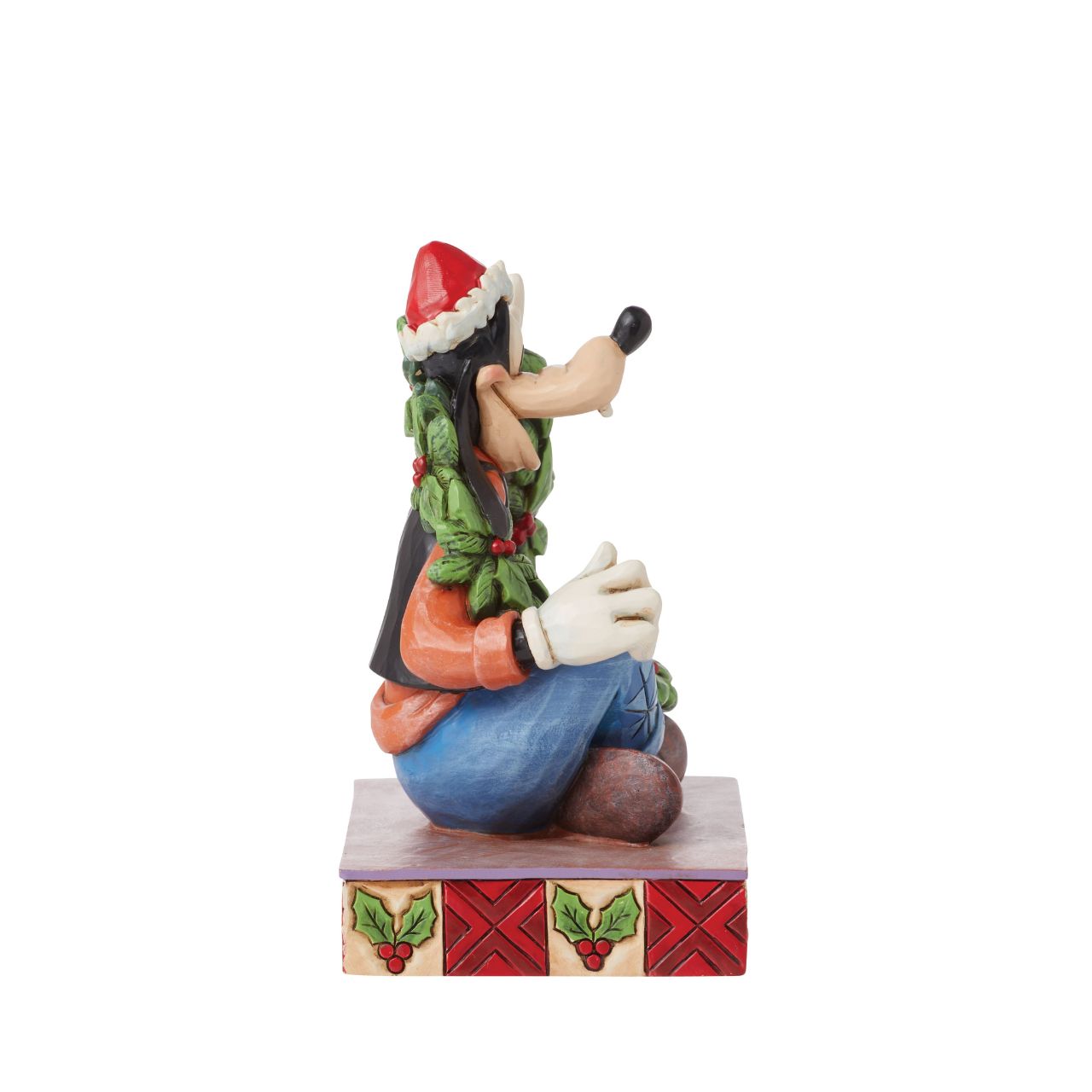 Goofy is celebrating Christmas in this cute festive figurine. Hand crafted by Disney Traditions, it comes in a fully branded gift box.