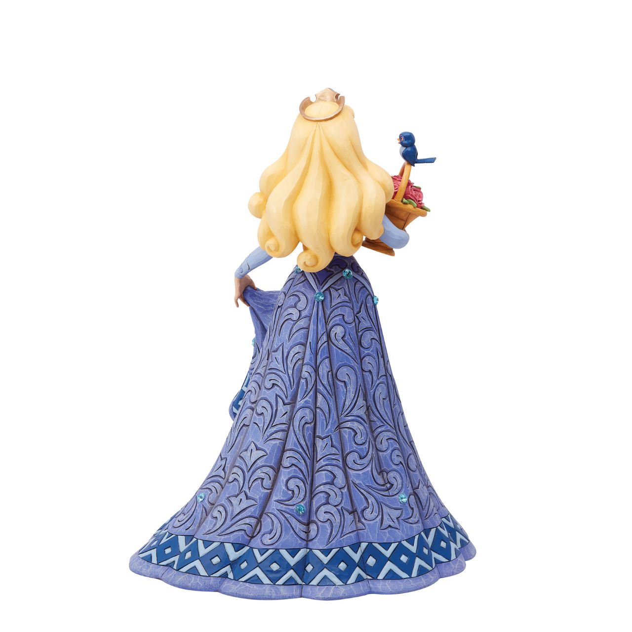 Introducing the Deluxe Aurora Figurine from Disney Traditions by Jim Shore. This exquisite piece depicts Sleeping Beauty Aurora in a beautiful, blue dress, accessorized with a stunning crown, carrying a basket of pink roses with a small bluebird perched on top.
