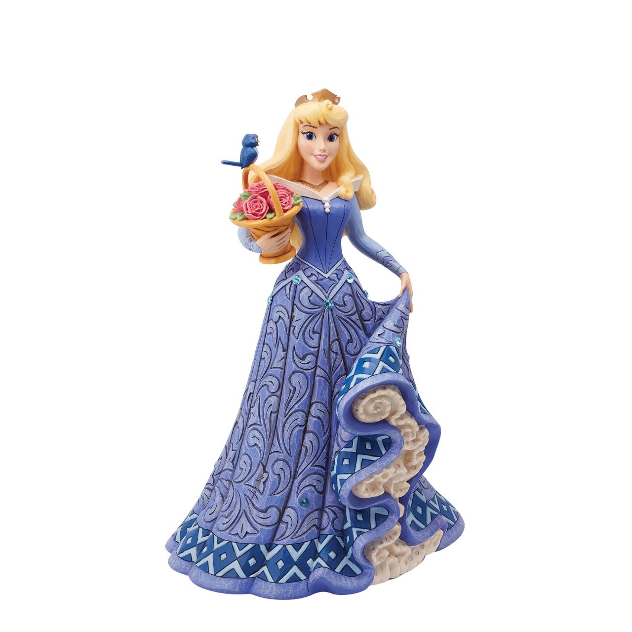 Introducing the Deluxe Aurora Figurine from Disney Traditions by Jim Shore. This exquisite piece depicts Sleeping Beauty Aurora in a beautiful, blue dress, accessorized with a stunning crown, carrying a basket of pink roses with a small bluebird perched on top.