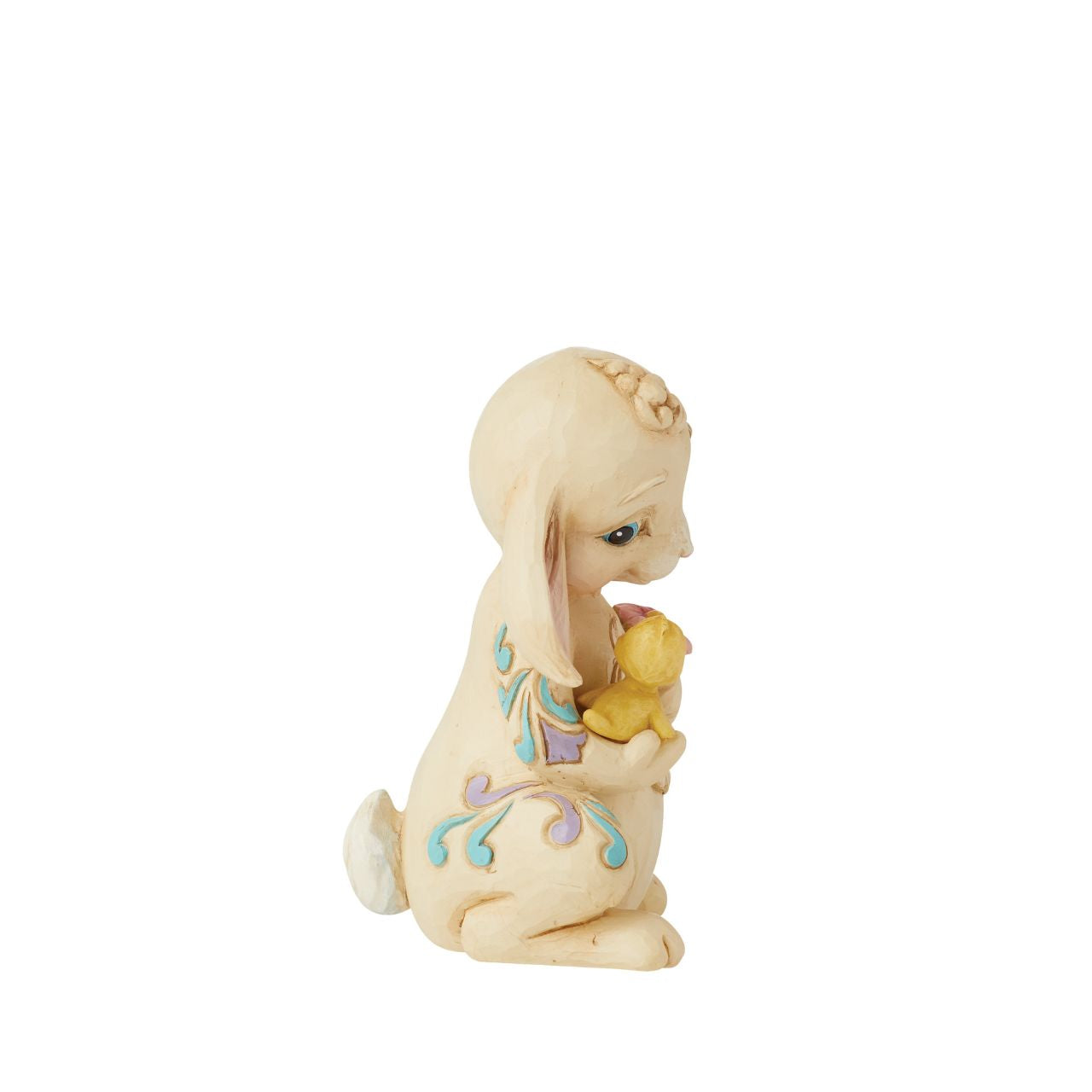 This mini Bunny figurine from the Heartwood Creek collection by Jim Shore is the perfect little addition to any Easter display. Hand carved and painted, this piece comes in fully branded packaging.
