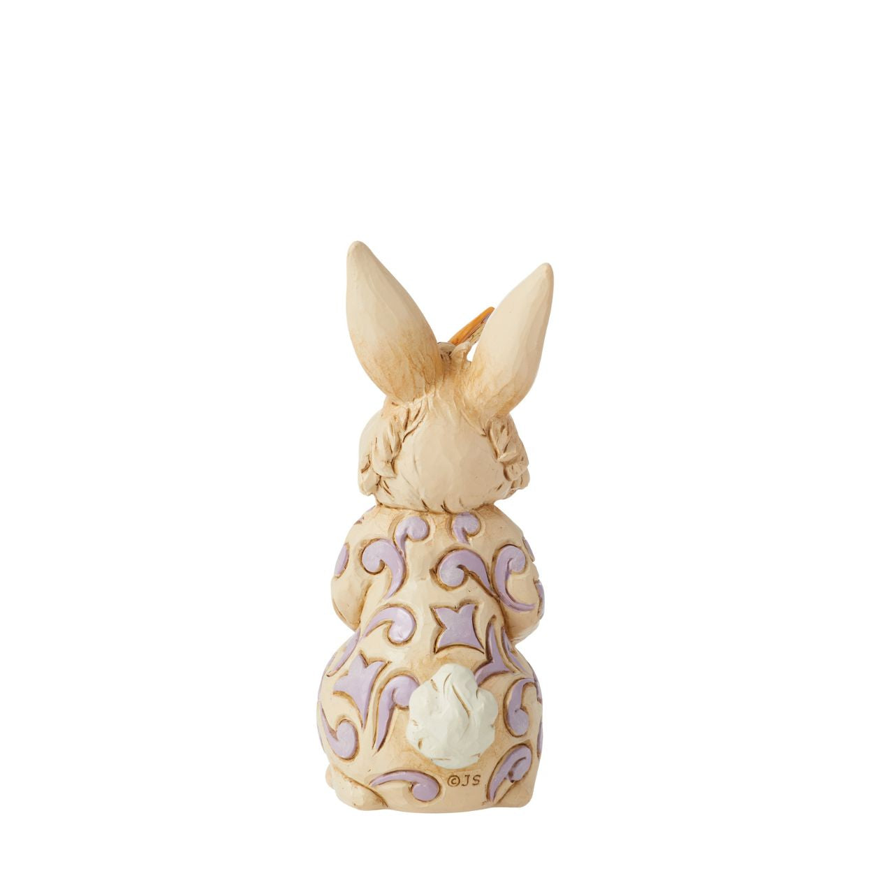 Enchanted by a butterfly resting on its nose, this adorable mini bunny stands tall with gentle sincerity. With delicate purple rosemaling on his fur, this Jim Shore rabbit figurine is sure to inspire smiles this Spring.