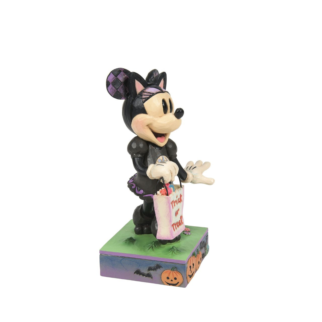 Celebrate Halloween with the Disney Traditions collection by Jim Shore. This iconic bust of Minnie Mouse is detailed with a spooky stage of jack-o-lanterns and bats. This mouse masquerades as a black cat to collect candy this holiday season.