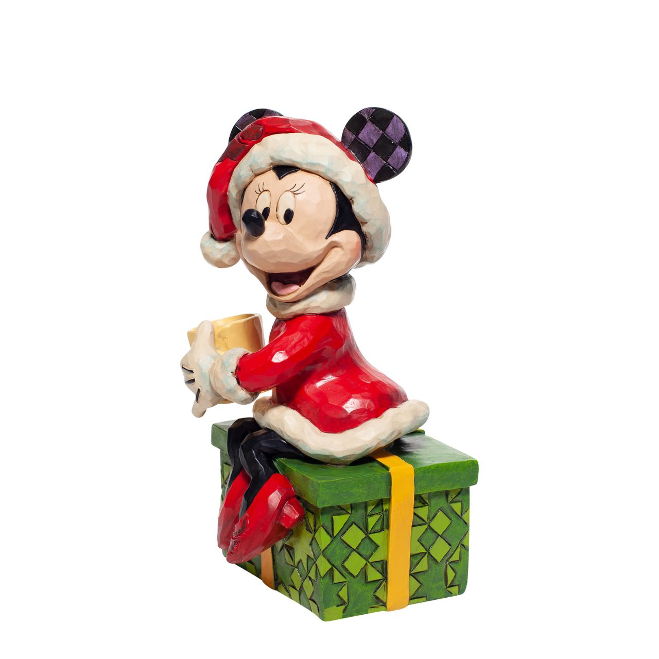 Disney Minnie Mouse with Hot Chocolate Figurine Dressed in a dainty Santa skirt and hat, Minnie soaks in the holiday spirit. Sipping from a cup of hot chocolate, this sweet mouse celebrates the most wonderful time of the year in style. Once again, Jim Shore captures the magic of Disney.