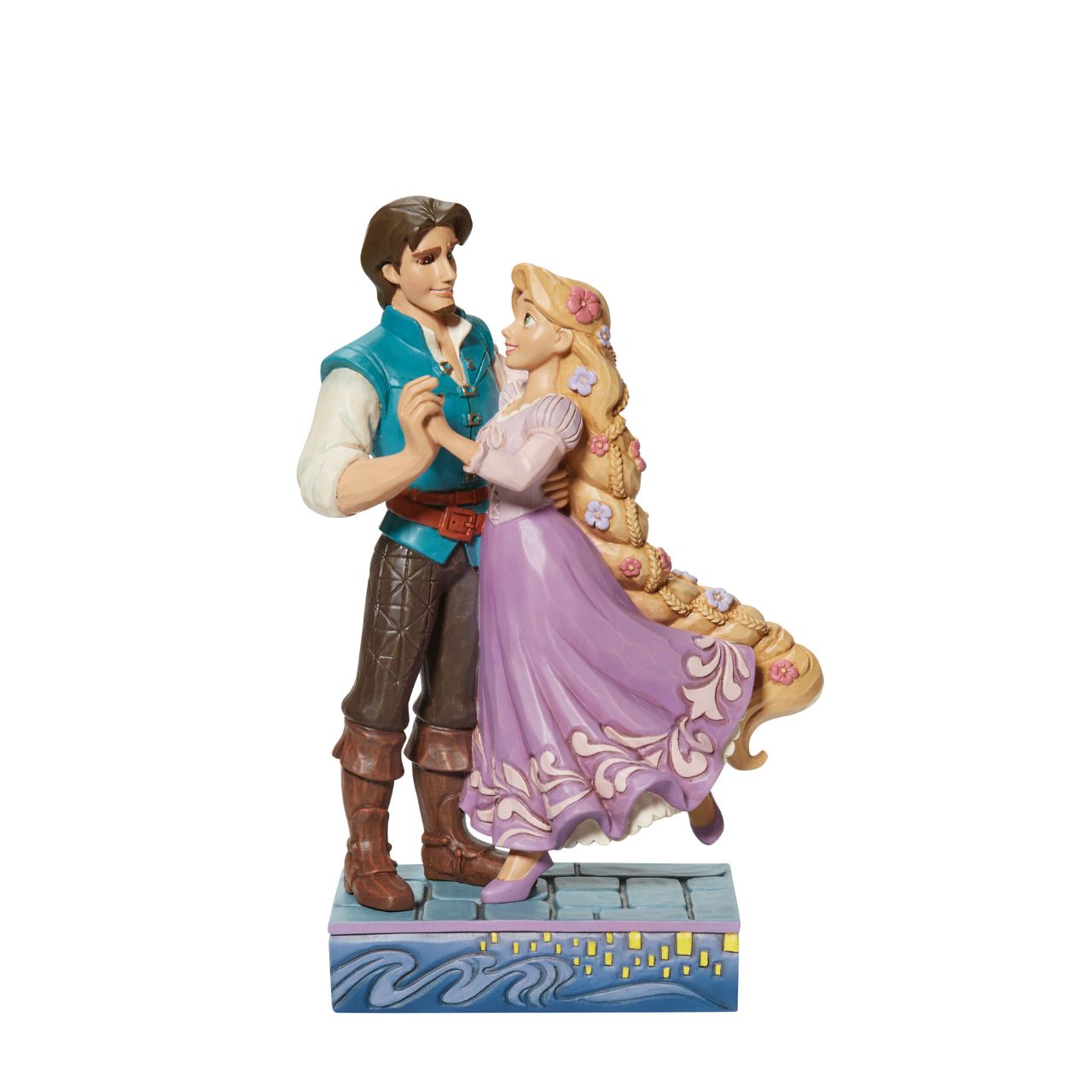Based on the beloved characters from the 2010 film Tangled, this piece showcases Rapunzel & Flynn Rider happy together. Designed by award winning artist Jim Shore, hand crafted using high quality cast stone and hand painted.
