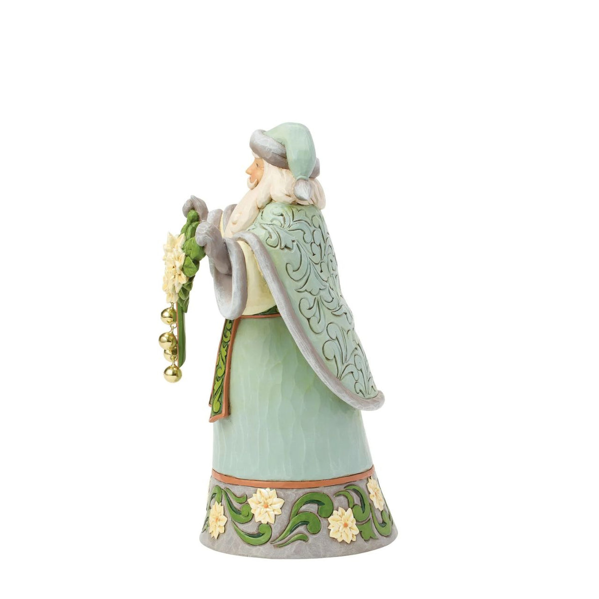 This joyful Santa is brimming with holiday cheer and jingle bells. Jim Shore's signature rosemaling patterns and rich colours bring depth and warmth to his festive coat. A charming way to ring in the magic of Christmas with every glance.
