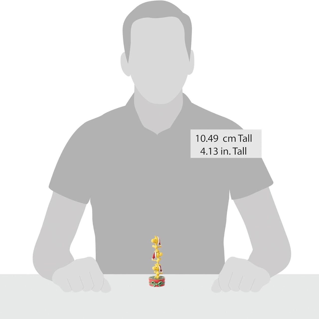 Celebrate Woodstock's 60th anniversary with this adorable creation from Jim Shore. Woodstock and his brothers don Santa hats and form a tower standing on one another's heads. With rosemale details, the trio delights with stacked holiday spirit.