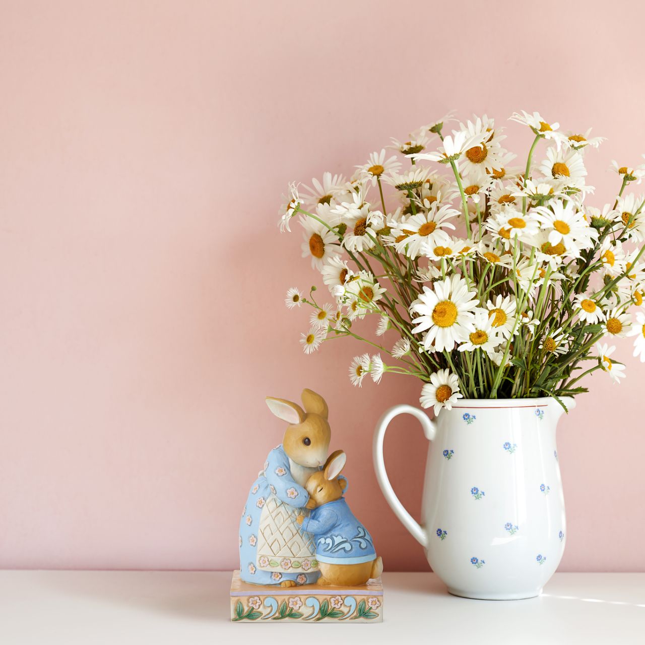 Jim Shore uplifts the treasured children's characters in this darling miniature. Beloved bunny, Peter Rabbit, melts into his mother's caring embrace. Holding her sweet boy close, she provides all the encouragement he needs for a day of adventuring.