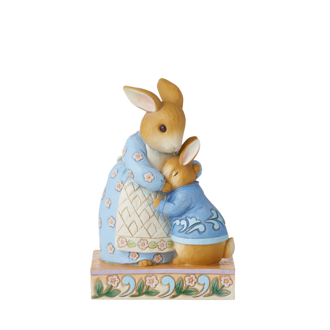 Jim Shore uplifts the treasured children's characters in this darling miniature. Beloved bunny, Peter Rabbit, melts into his mother's caring embrace. Holding her sweet boy close, she provides all the encouragement he needs for a day of adventuring.