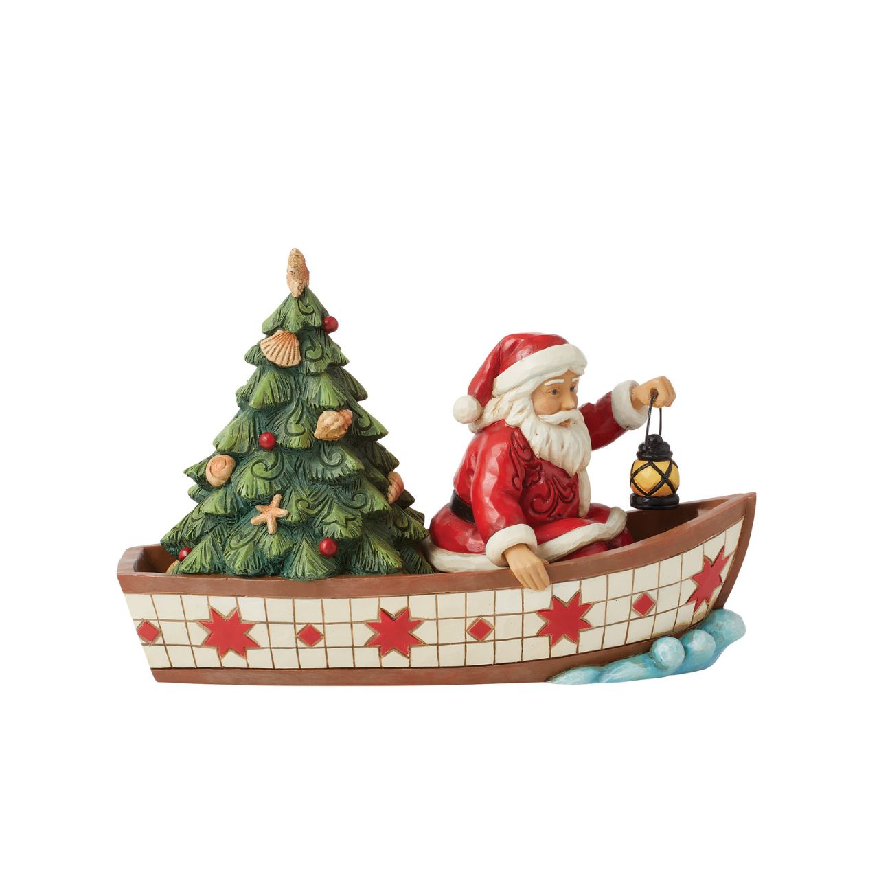 Santa Claus delivers to everywhere in the world. Sometimes he uses other means of transportation than his reindeer sleigh. For coastal deliveries, Santa utilizes a gorgeous red and white boat complete with shell adorned tree and guiding lantern.