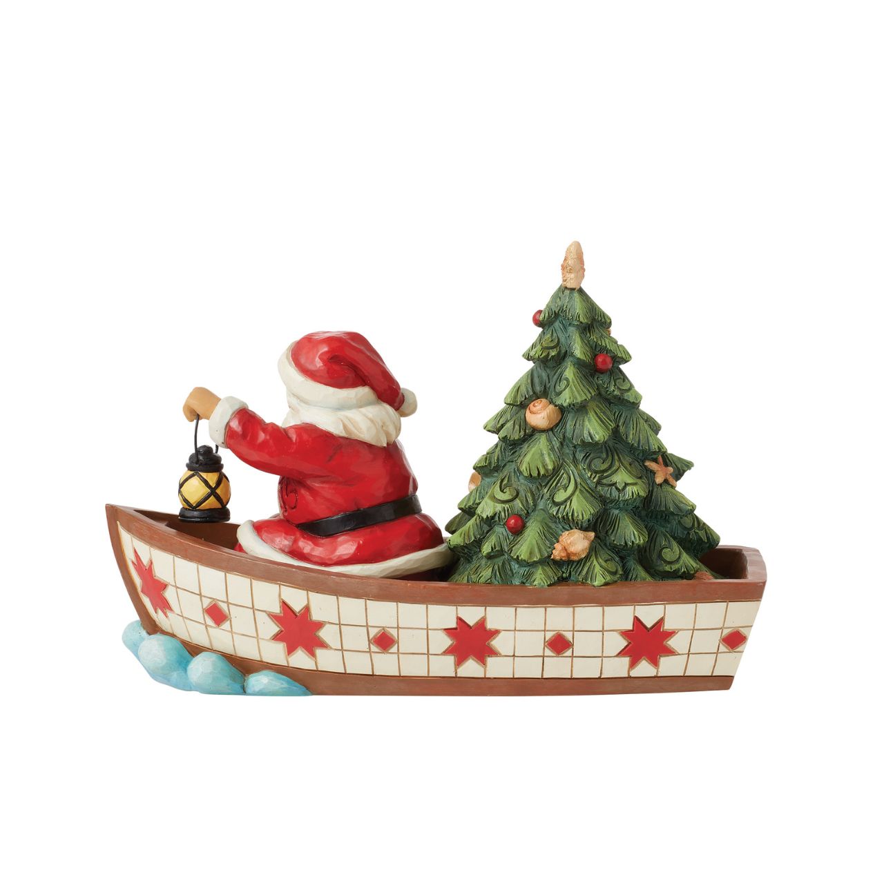 Santa Claus delivers to everywhere in the world. Sometimes he uses other means of transportation than his reindeer sleigh. For coastal deliveries, Santa utilizes a gorgeous red and white boat complete with shell adorned tree and guiding lantern.