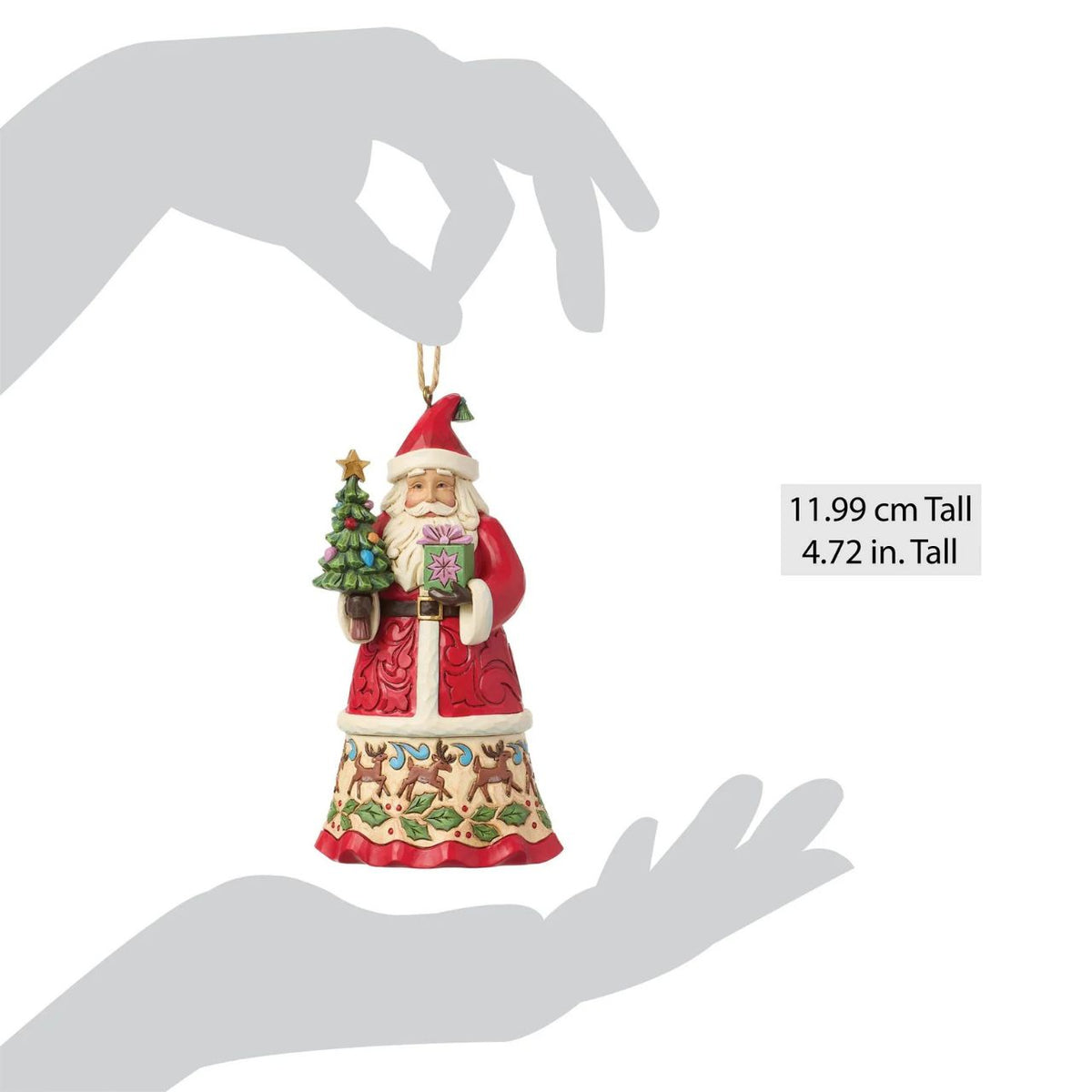 Celebrate the magic of Christmas with this enchanting Santa figurine from Heartwood Creek by Jim Shore. Depicting Santa Claus lovingly holding a variety of colourful gifts, this piece is meticulously crafted with intricate details and folk-art inspired patterns.