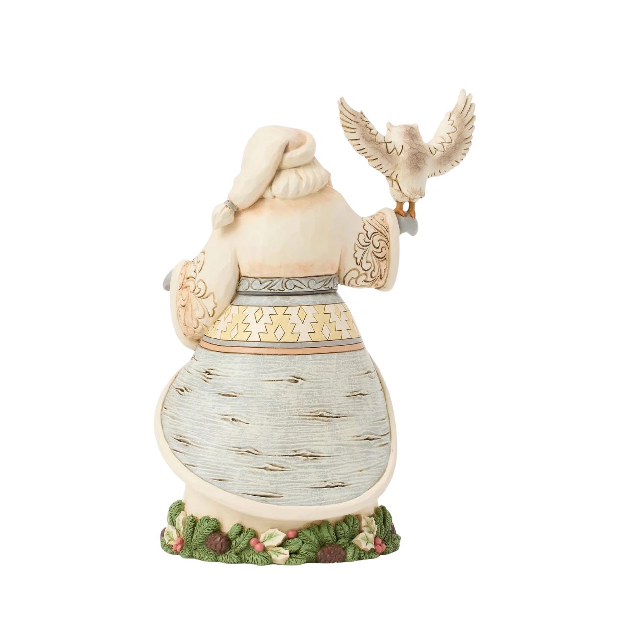This stunning Jim Shore design features Santa adorned in a gorgeous white cloak trimmed with lush garland, reaching out to a majestic owl.