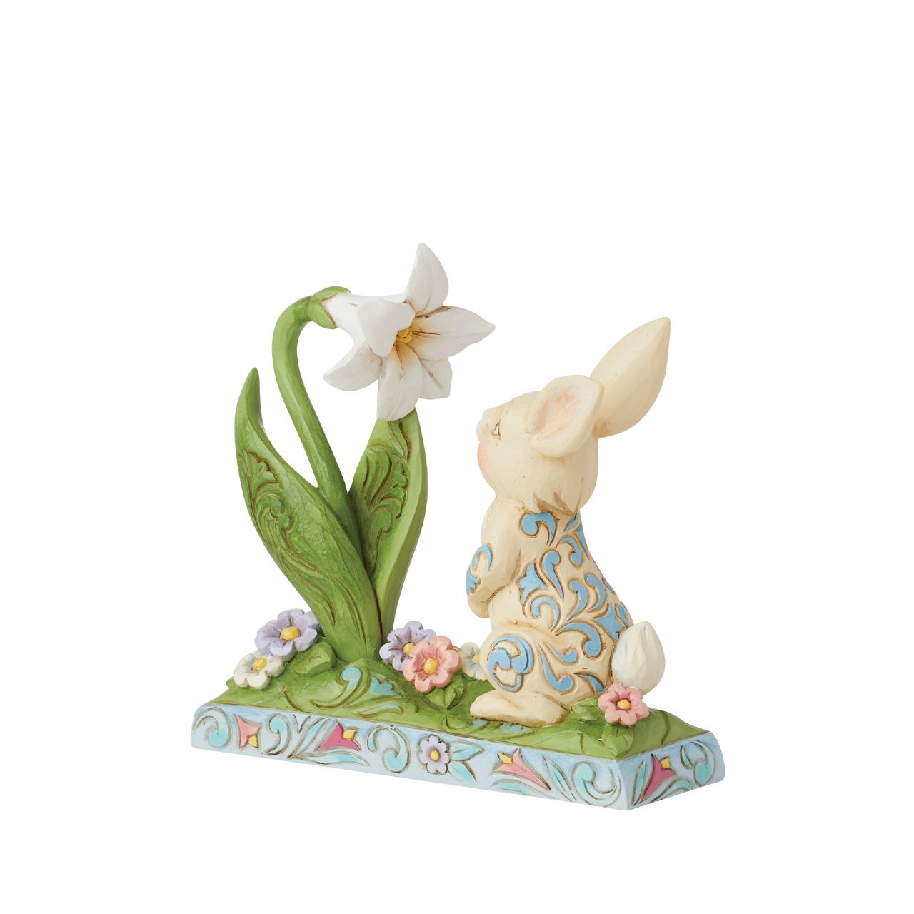Celebrate Spring breaking through and the joy of Easter with this sweet figurine of a bunny sniffing the first Lilly of the season. Hand carved and painted. Comes in fully branded packaging.