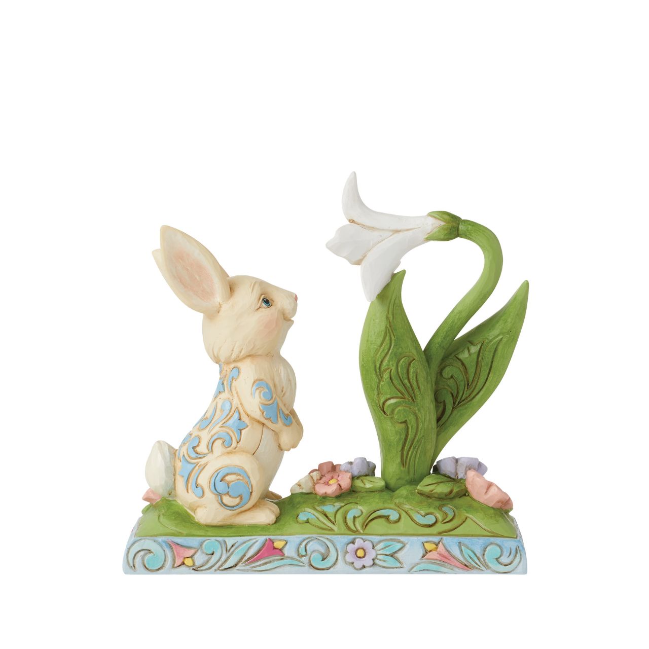 Celebrate Spring breaking through and the joy of Easter with this sweet figurine of a bunny sniffing the first Lilly of the season. Hand carved and painted. Comes in fully branded packaging.