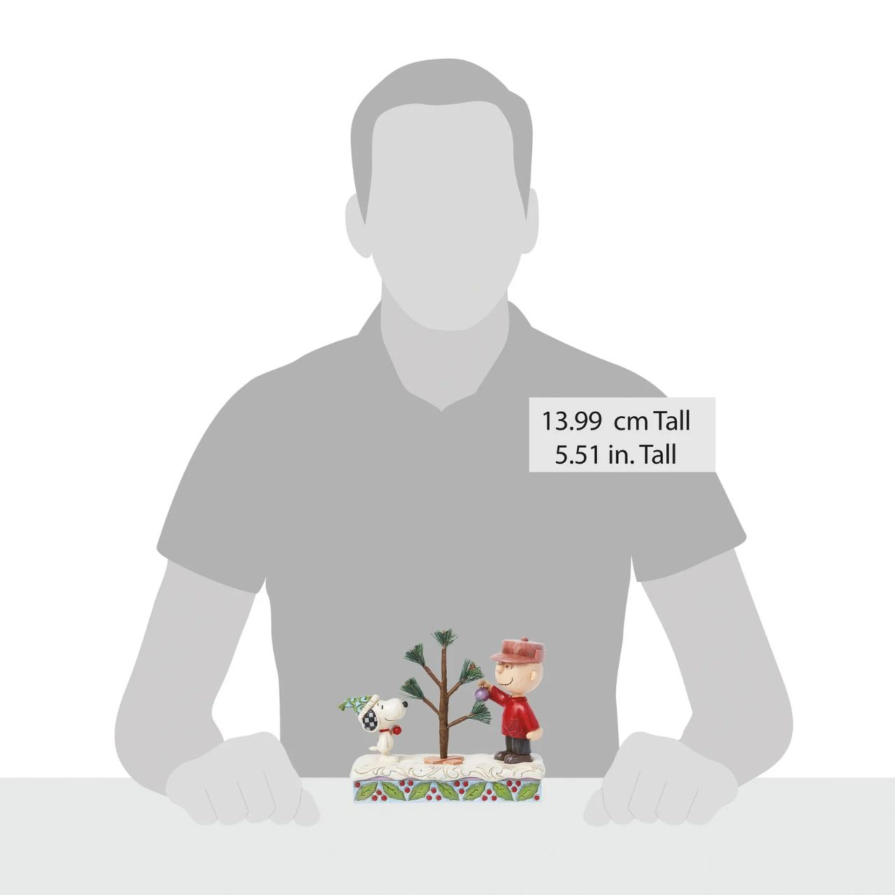 This iconic Jim Shore creation shares a memorable scene from "A Charlie Brown Christmas" special. Charlie picked out a small sampling with hardly any branches, nevertheless, the Peanuts gang came together to decorate it into something wonderful.