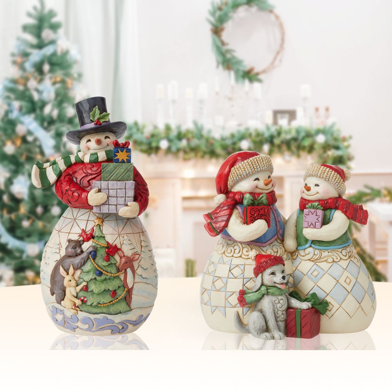 Heartwood Creek Christmas Collection Snowman Couple with Puppy Figurine Designed by award winning artist Jim Shore as part of the Heartwood Creek Christmas Collection, hand crafted using high quality cast stone and hand painted, this Snowman couple with their cute puppy is perfect for the Christmas season.