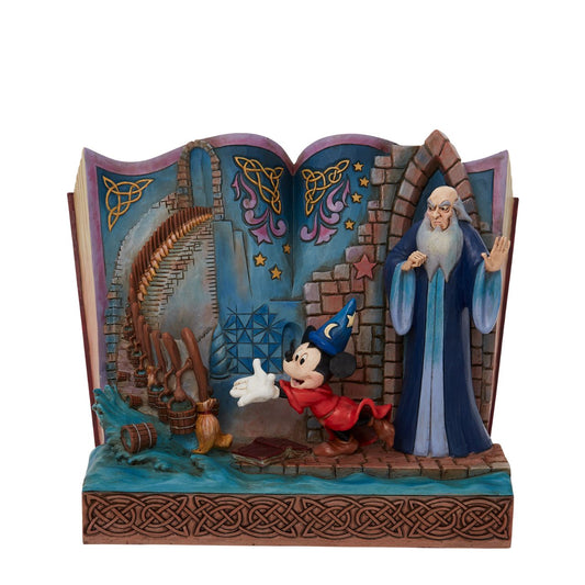 Disney Showcase Sorcerer Mickey Storybook Figurine  Jim Shore re-imagines Fantasia in fantastic fashion in this enchanting statuette by Jim Shore. Mickey Mouse plays sorcerer as he enchants broomsticks to do chores while mentor Yen Sid watches. The complete scene rests inside the pages of a storybook.