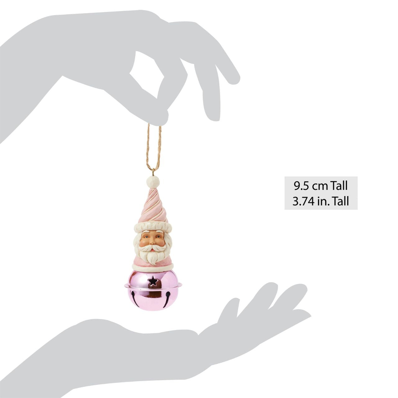 This delightful Jim Shore Heartwood Sweets jingle bell ornament features a charming miniature bust of Santa, complete with a pastel pink icing hat and rosy cheeks that exude holiday cheer. Ring in the season with Jim Shore.