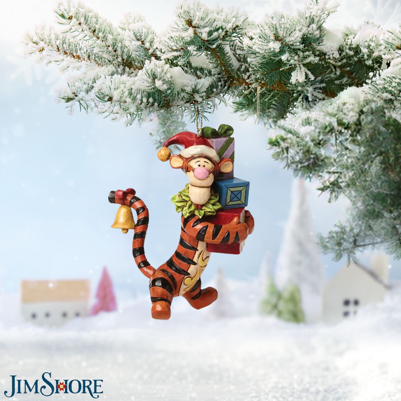 Disney Traditions Tigger Hanging Ornament  This hanging ornament shows that Tigger will do anything for ole St. Nick! Designed by award winning artist and sculptor, Jim Shore for the Disney Traditions brand. The hanging ornament is made from cast stone.