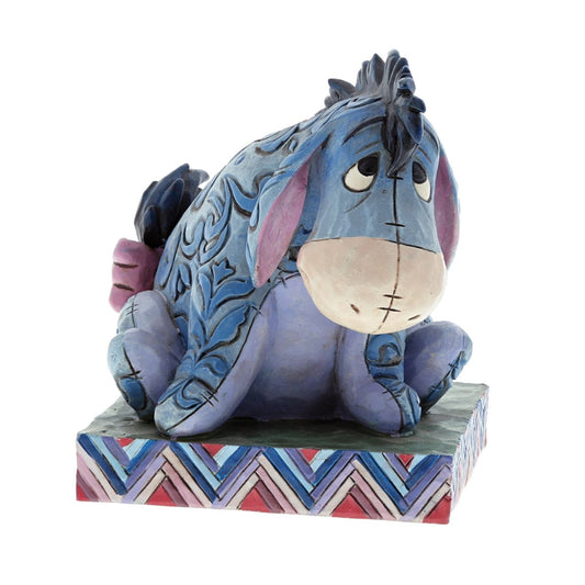 Disney True Blue Companion Eeyore Figurine by Jim Shore  Eeyore is one of the most popular and loveable Disney characters. This figurine by award winning artist and sculptor, Jim Shore is a great addition to your Disney Traditions collection.