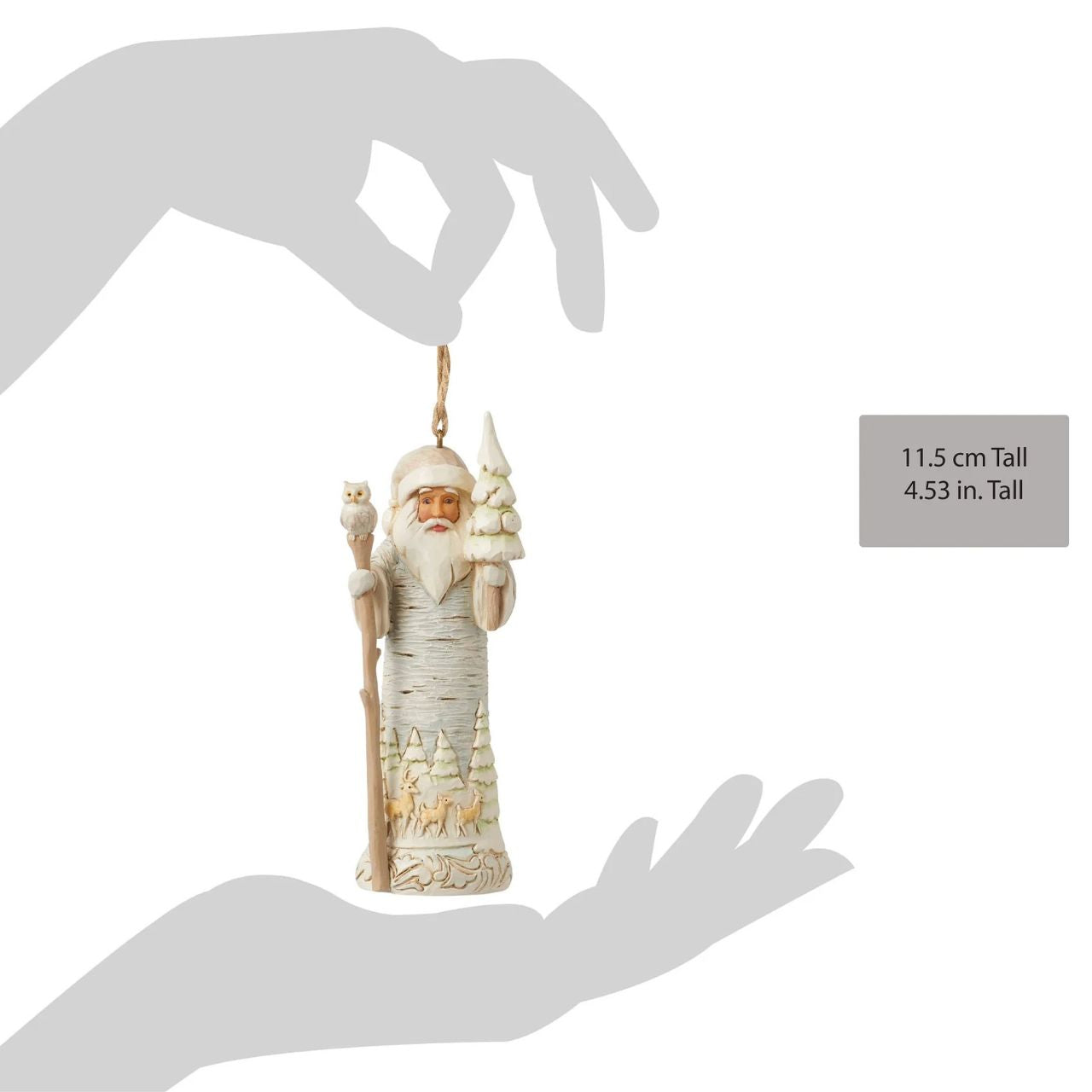 From the White Woodland collection as part of Heartwood Creek by Jim Shore, this Santa hanging ornament is created to look like he is carved from silver birch wood, a fun and creative way to bring the outside in this Christmas.