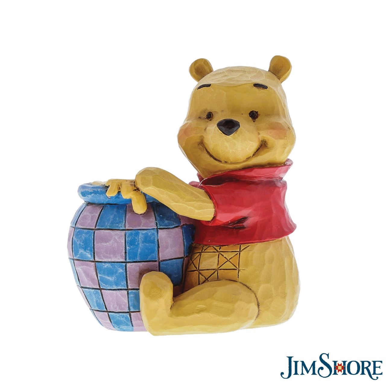 Jim Shore's Winnie the Pooh with Honey Pot Beautifully handcrafted with delightful attention to detail, Jim Shore's charming miniatures capture the essence of the beloved Disney characters. A smiling Winnie the Pooh hugs his jar of honey in this classic moment inspired by the classic film.