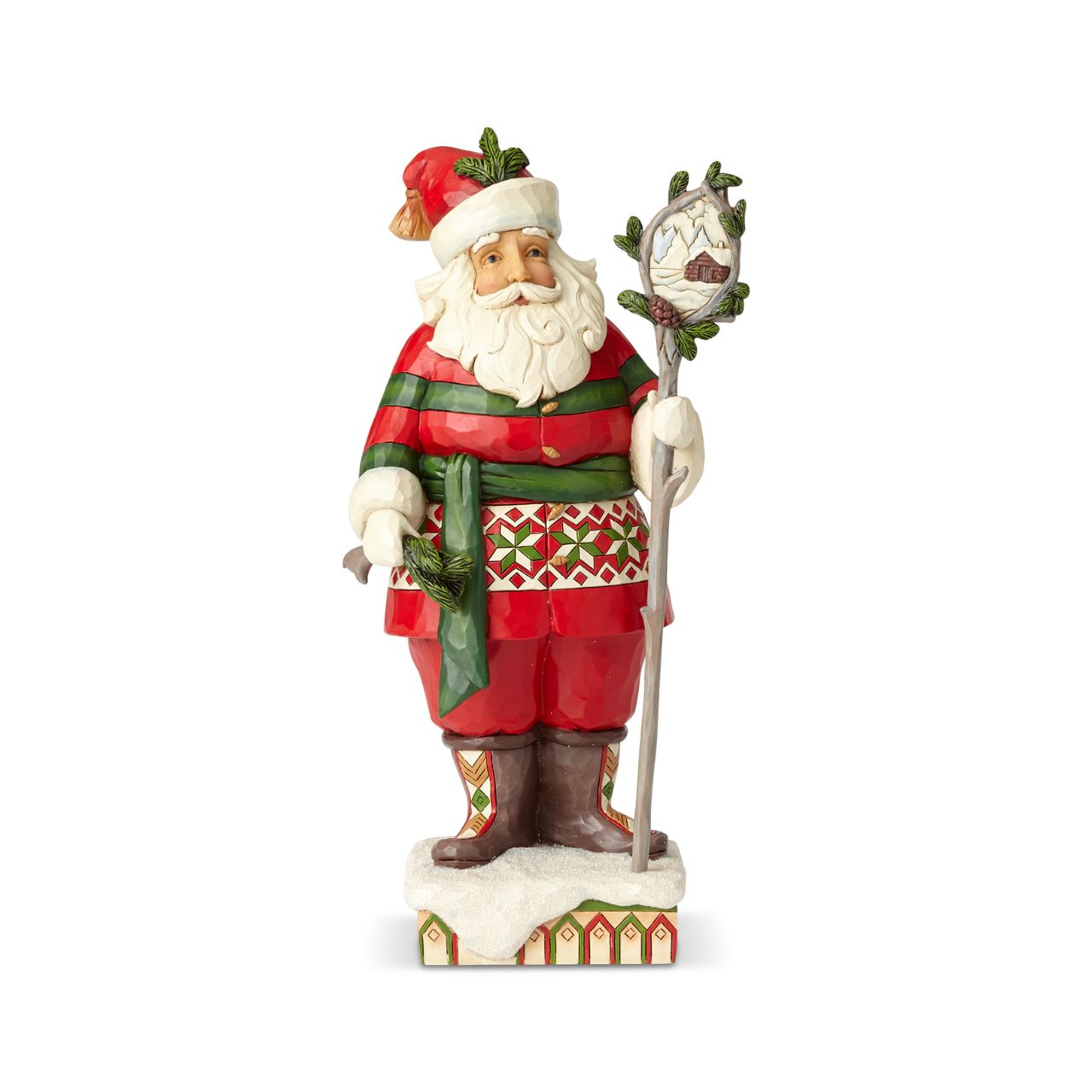 Heartwood Creek Wonder in the Wilderness - Woodsy Santa by Jim Shore The delight is in the details with this handcrafted Santa figurine. Intricate quilt patterns and folk art motifs detail his festive red and green attire, and a closer look at the staff he holds reveals a charming winter cabin scene.