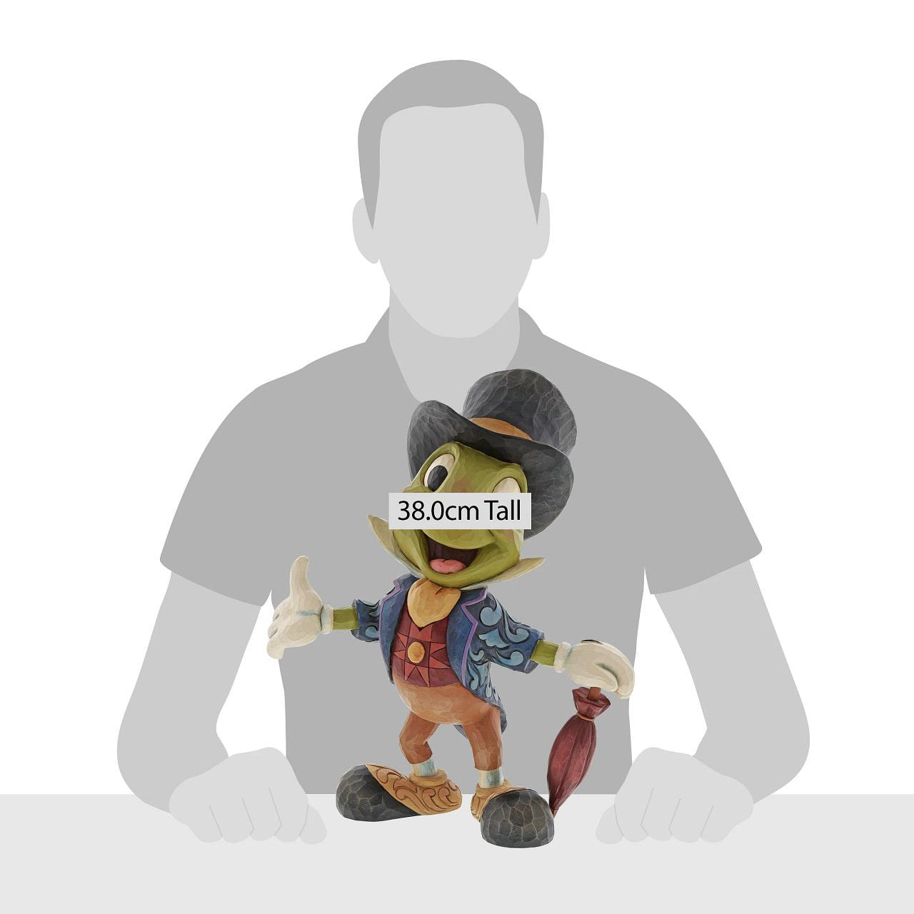 Jim Shore Cricket's the Name. Jiminy Cricket Statement Figurine Jiminy Cricket, Pinocchio's conscience, smiles brightly in this Jim Shore figurine. Dressed in his classic suit, ascot, and top hat, Disney's unofficial mascot holds his umbrella ready to issue advice to anyone in moral dilemma.