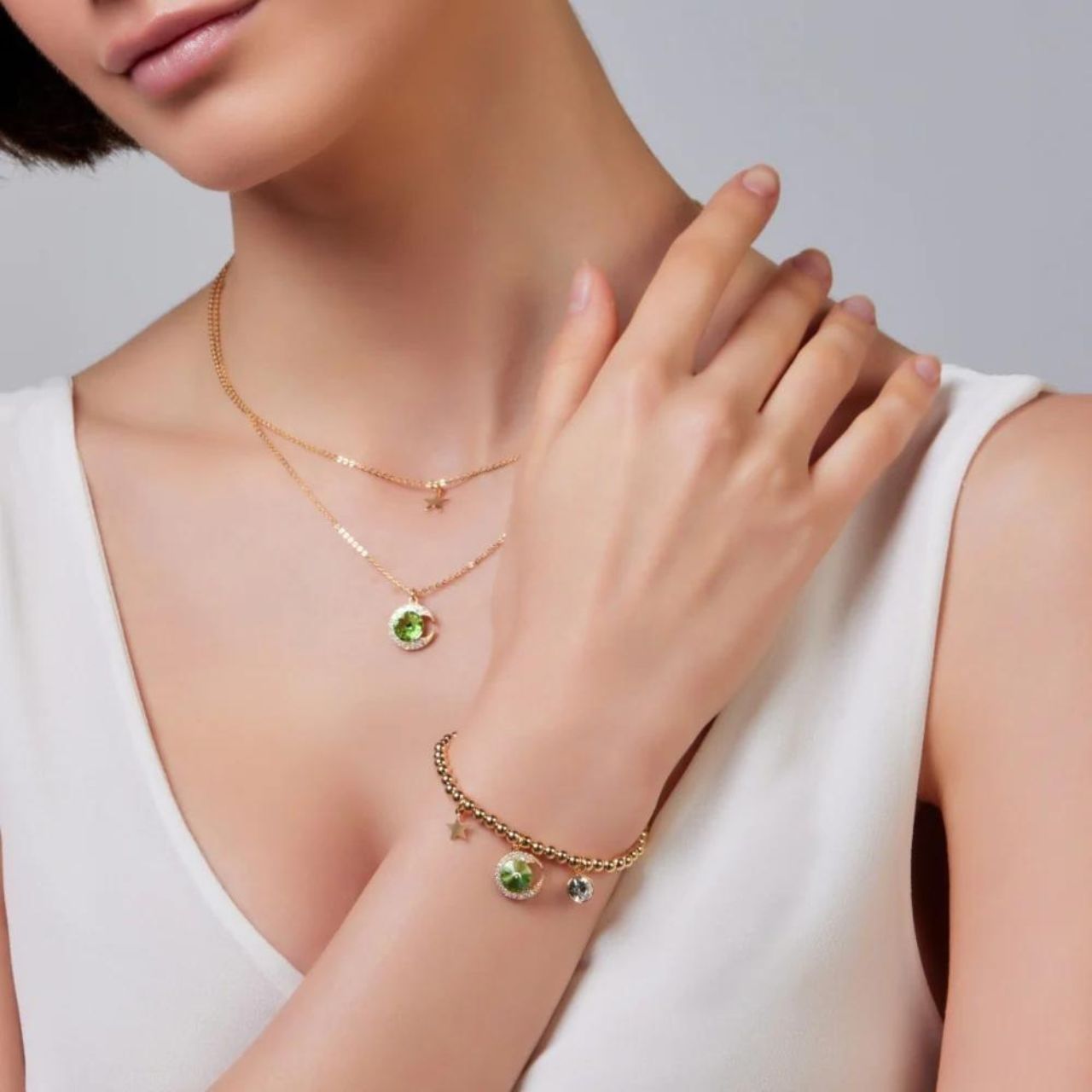 Knight & Day Green Moon Layered Necklace Green moon layered necklace with moon & star charms.