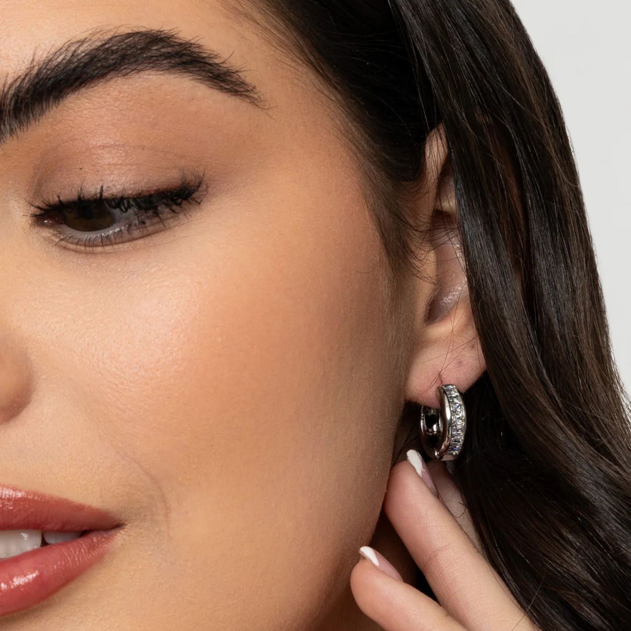 Small hoops with baguette style CZ stones.