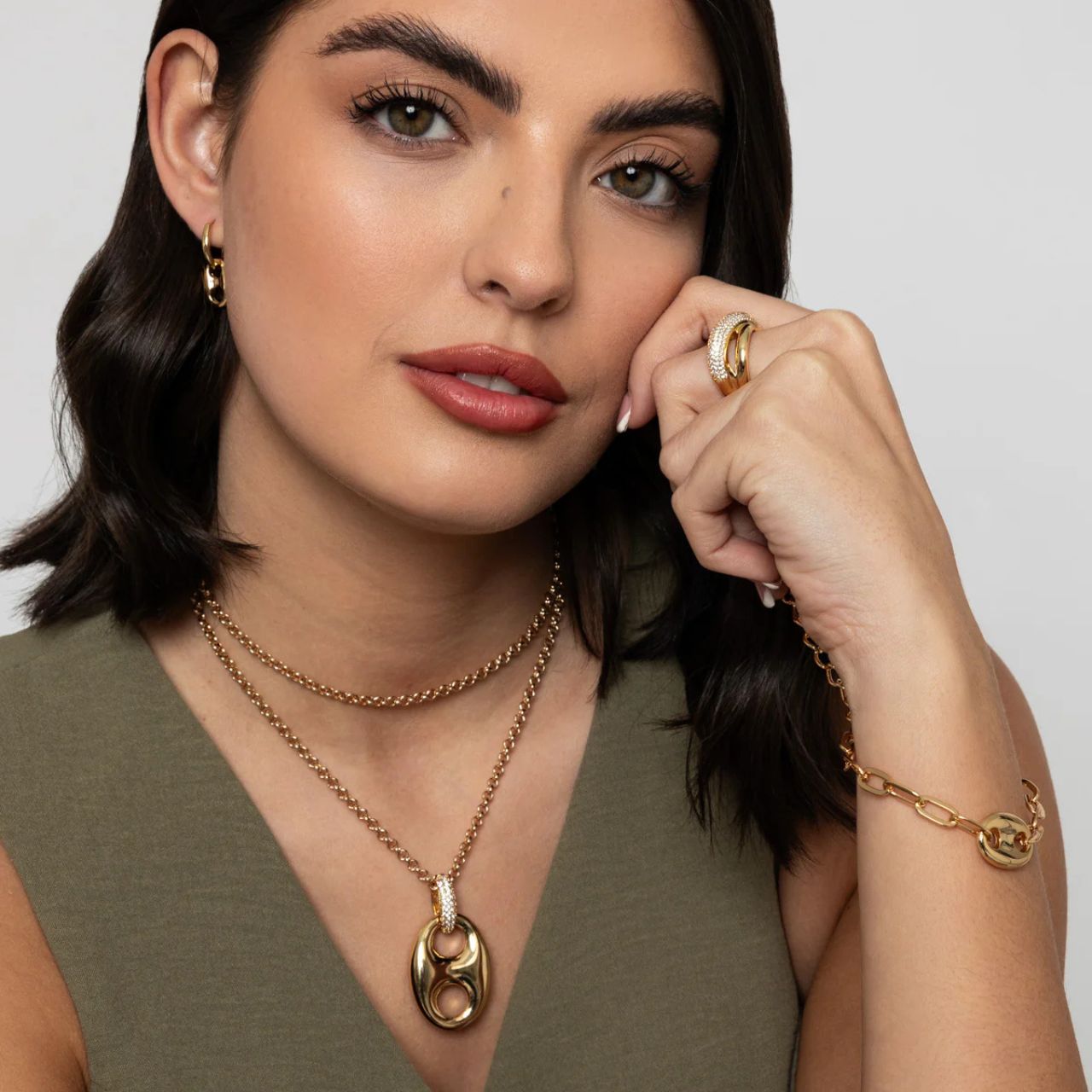 Lightweight contemporary style drop earrings with French clip fastening. Gold plating. Length 2.25cm.