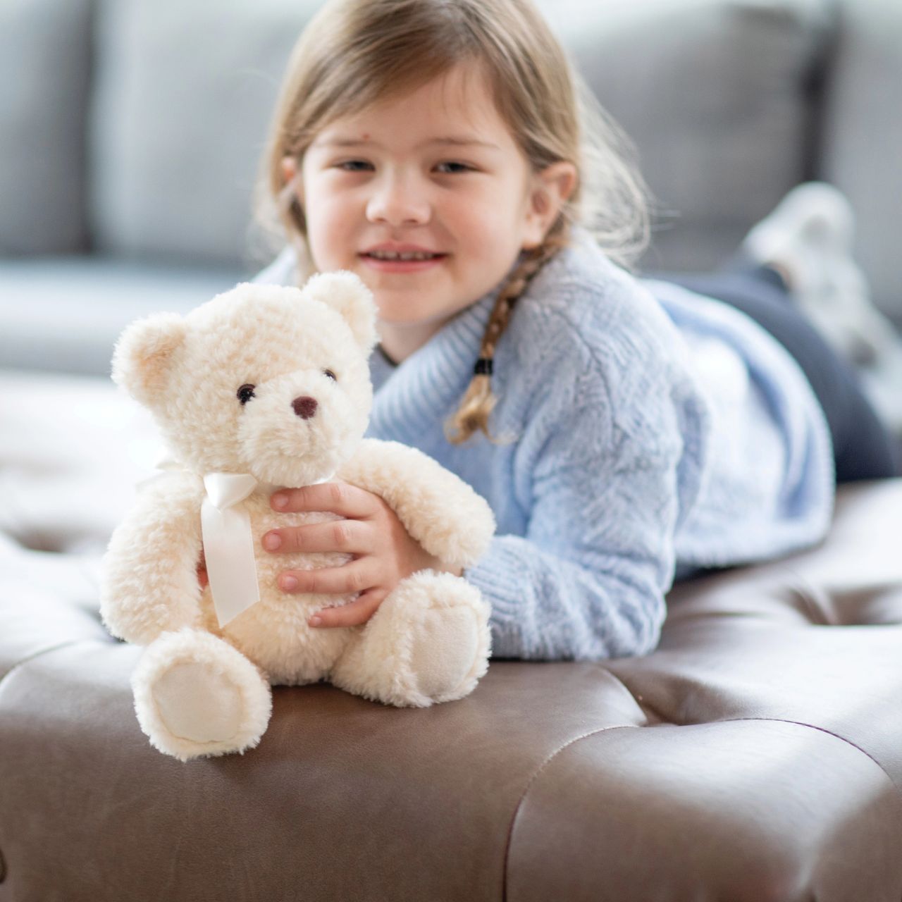 Introduce a touch of luxury to your collection with Teddy McBearsley, a perfect blend of elegance and comfort. This bear features exquisite textured fur and a classic satin ribbon, making it an ideal choice for premium gift selections and upscale displays.