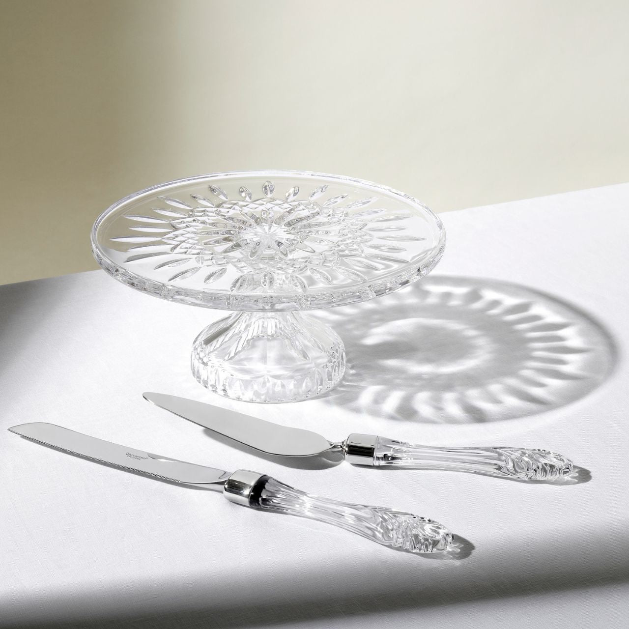 Lismore Cake Pie Server by Waterford The Waterford Lismore pattern is a stunning combination of brilliance and clarity. A crystal keepsake to be treasured for years to come, the Lismore Cake/Pie Server features an elegant, fine crystal handle intricately detailed in Lismore's signature diamond and wedge cuts.