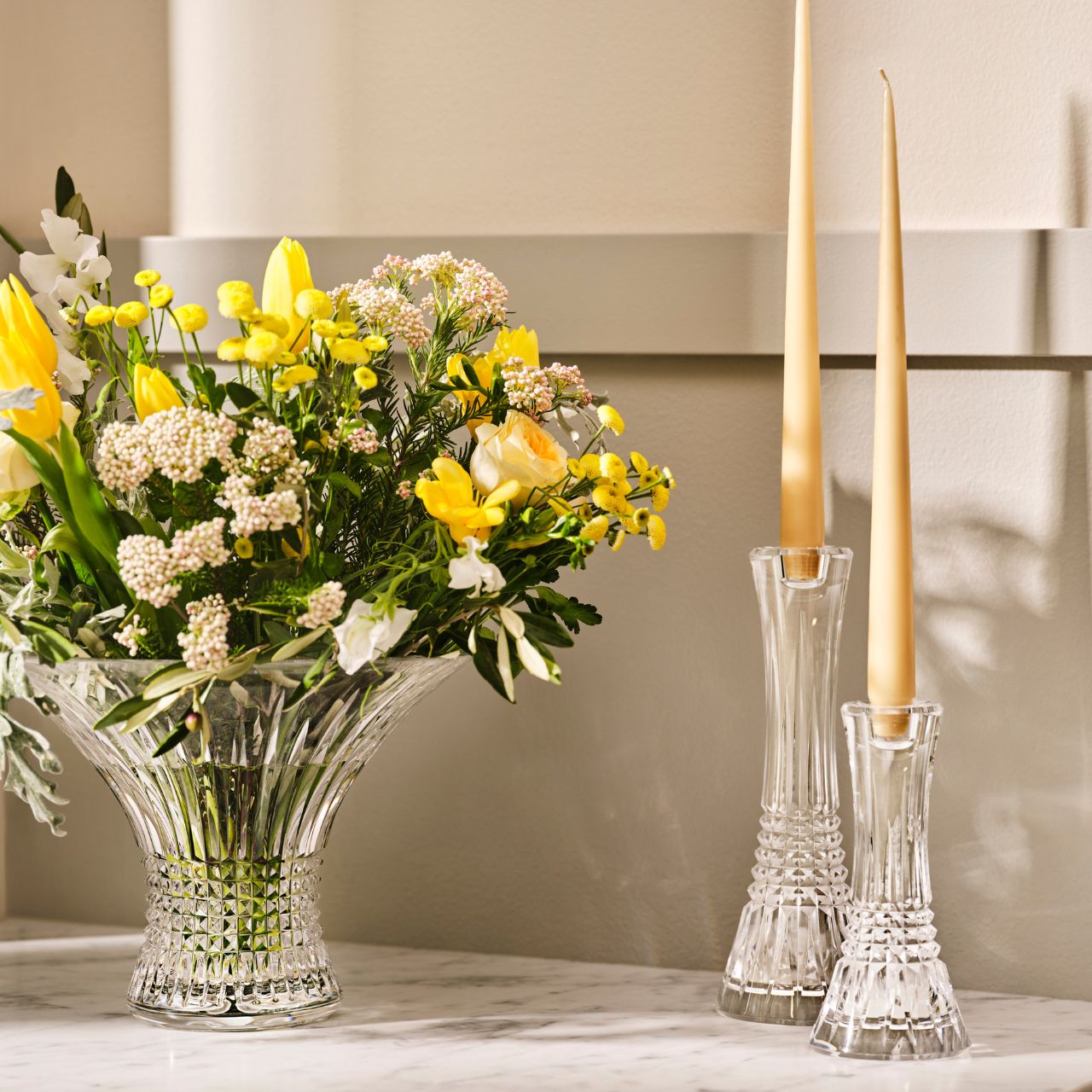 Lismore Diamond Candlestick 10" Set/2 by Waterford Crystal The Lismore Diamond pattern is an enduring reinvention of the Waterford classic; characterised by intricate diamond cuts rendered in radiant fine crystal. The Lismore Diamond 10” Crystal Candlestick Pair are beautifully cut vessels for taper candles, featuring the unrivalled quality and clarity of Waterford crystal to illuminate every moment.