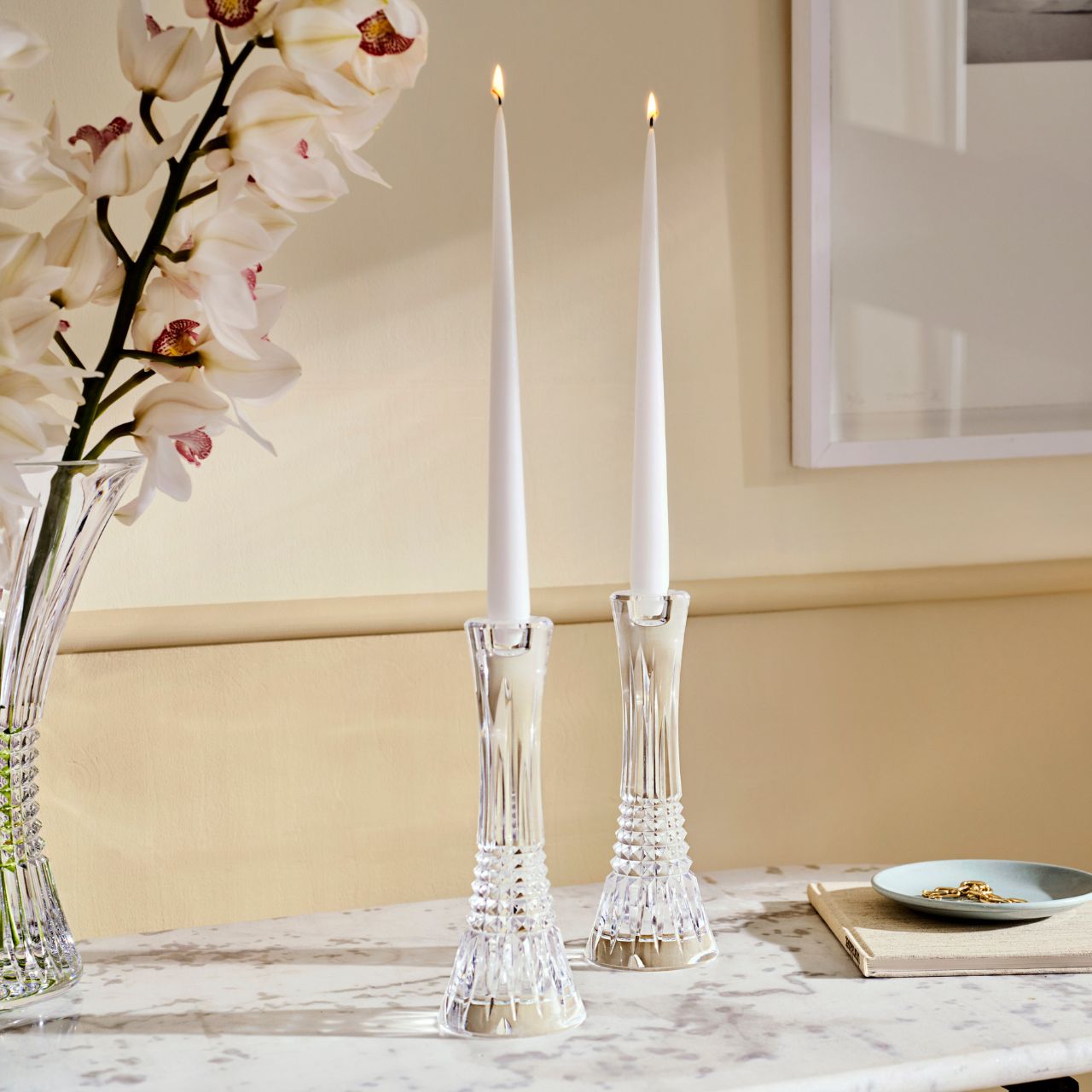Lismore Diamond Candlestick 10" Set/2 by Waterford Crystal The Lismore Diamond pattern is an enduring reinvention of the Waterford classic; characterised by intricate diamond cuts rendered in radiant fine crystal. The Lismore Diamond 10” Crystal Candlestick Pair are beautifully cut vessels for taper candles, featuring the unrivalled quality and clarity of Waterford crystal to illuminate every moment.