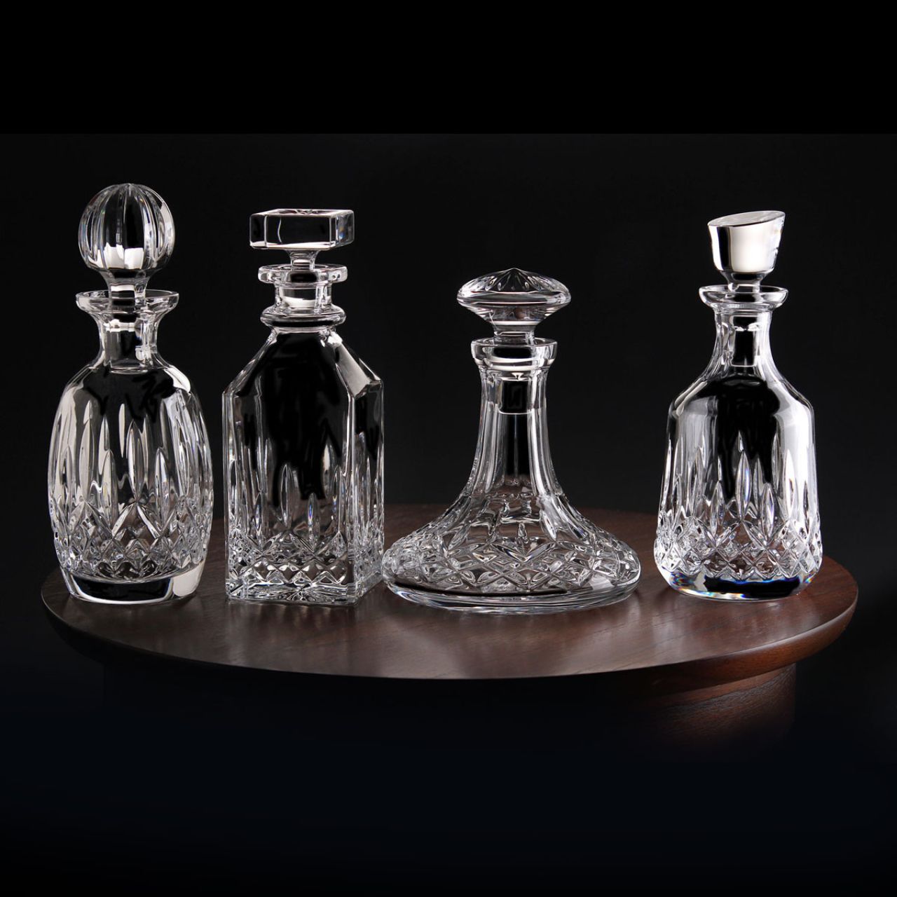 Waterford Crystal Lismore Square Decanter Proudly pour your favourite single malt from this charming Lismore 26oz Square Decanter and become a connoisseur. With its striking square profile, this traditional crystal whiskey decanter will look magnificent as it highlights the rich colour of its contents, radiating luxury and excellence as you entertain guests or savour something that is too good to share.