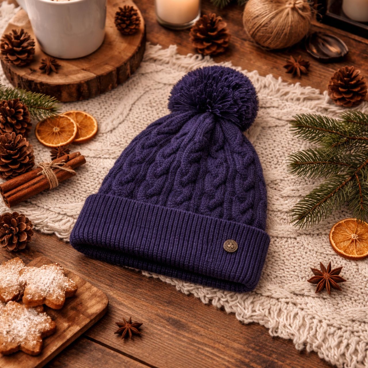 Crafted from high quality materials, the Man of Aran Navy Cable Bobbin Lined Beanie offers both style and warmth. The classic cable design adds a touch of sophistication, while the lined interior provides added comfort and insulation. A must-have accessory for any winter wardrobe.