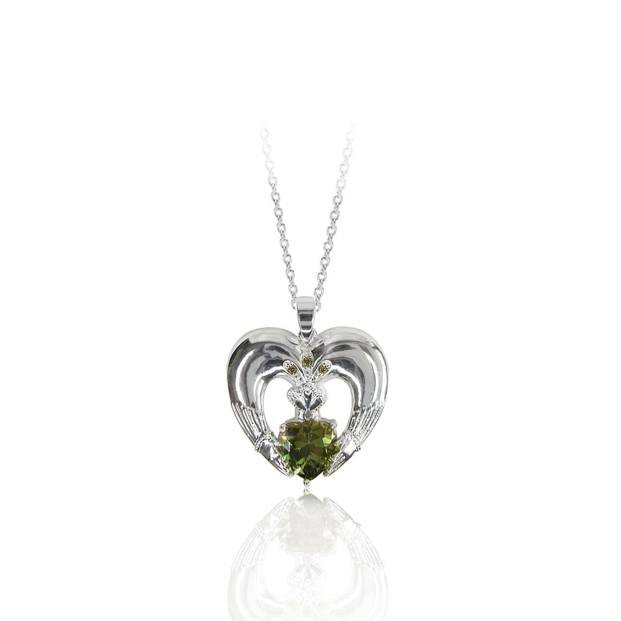Celebrating love, loyalty and friendship, this heart-shaped Claddagh pendant shimmers. An emerald green heart-shaped stone is set at the center and adorned with a shimmering crown with three green crystal stone accents. This meaningful pendant will be cherished forever. Glistening with a bright polished finish, it suspends from a sleek linear bale and a cable chain with a 2” extension. It closes securely with a lobster claw clasp.