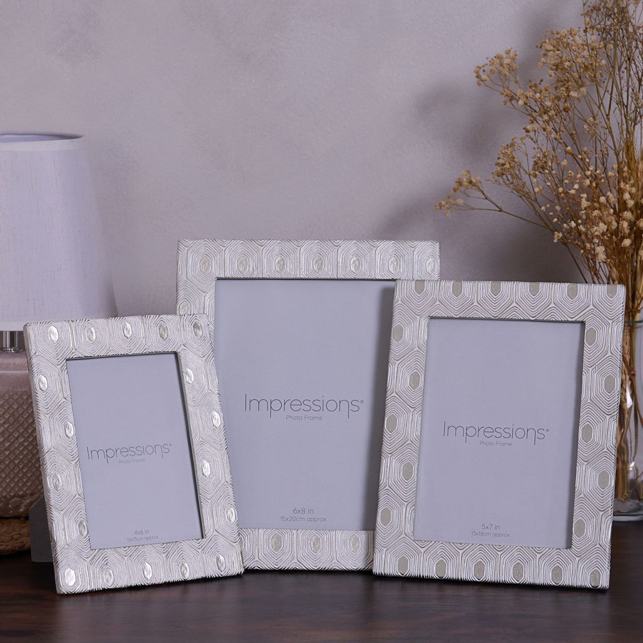 This attractive frame will enhance both the photographs within it and the room it sits within.