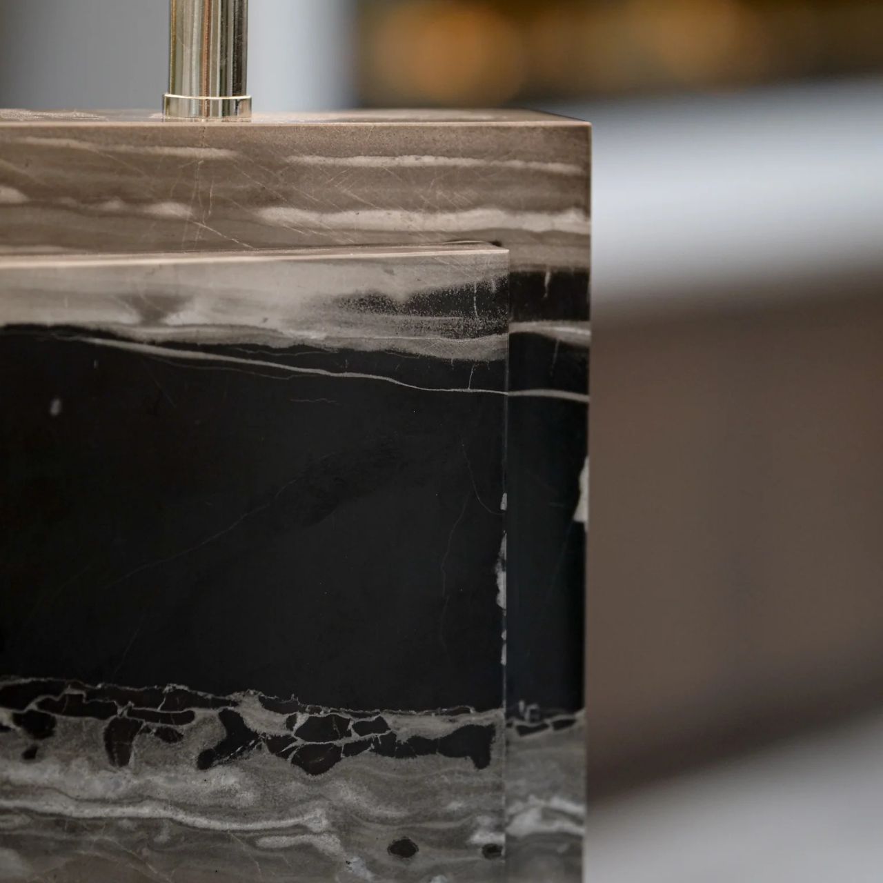 Marble-finished base and charcoal shade. Chrome Accents. Sleek & Contemporary in design. Ideal for any room in the home.