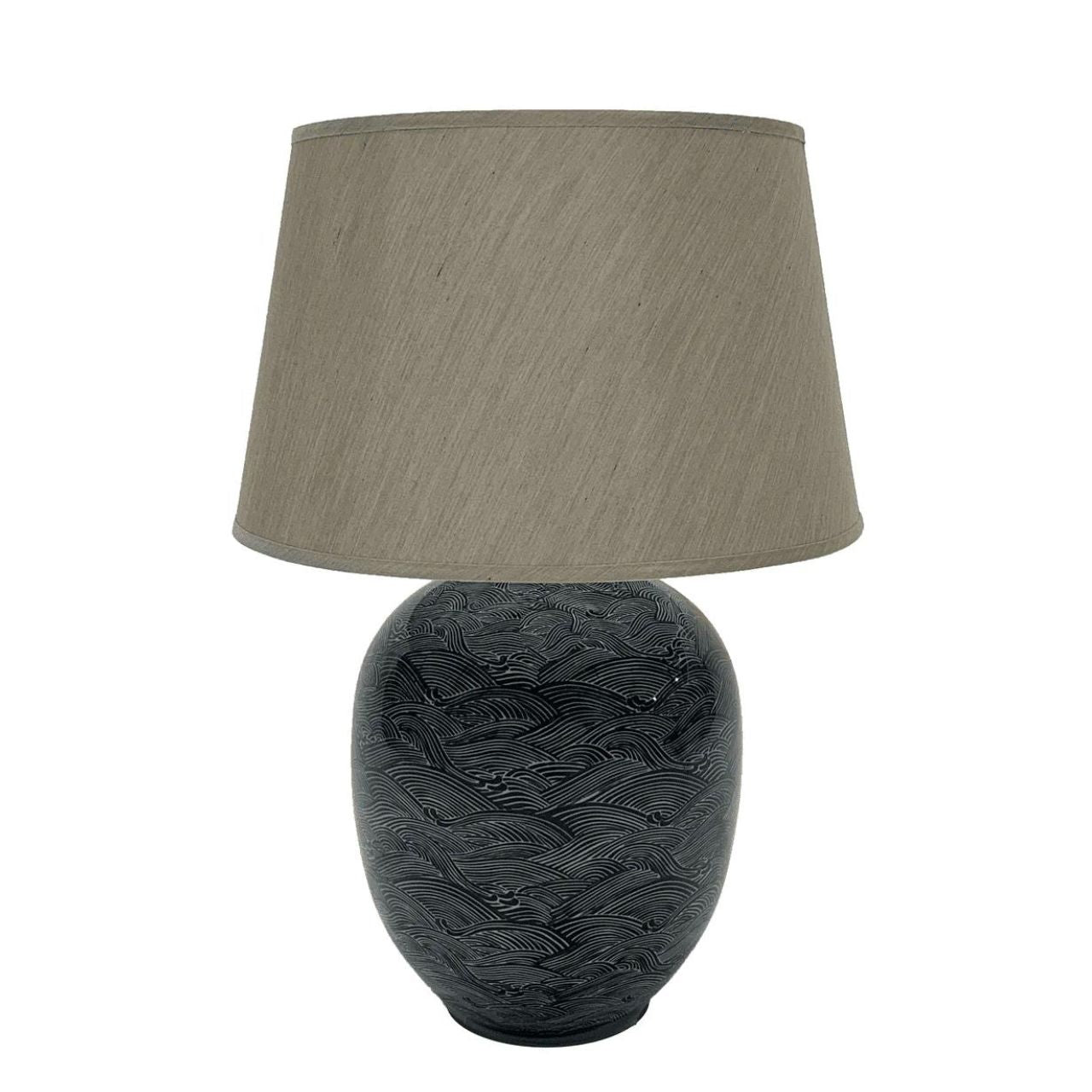 Blue Waves Lamp by Mindy Brownes Mindy Brownes Ceramic Lamp. Good lighting is essential for every home. Our ceramic collection is traditional yet timeless and featuring stunning designs, prints and patterns bursting with colour. This lamp features blue and navy wave details with a taupe linen shade.