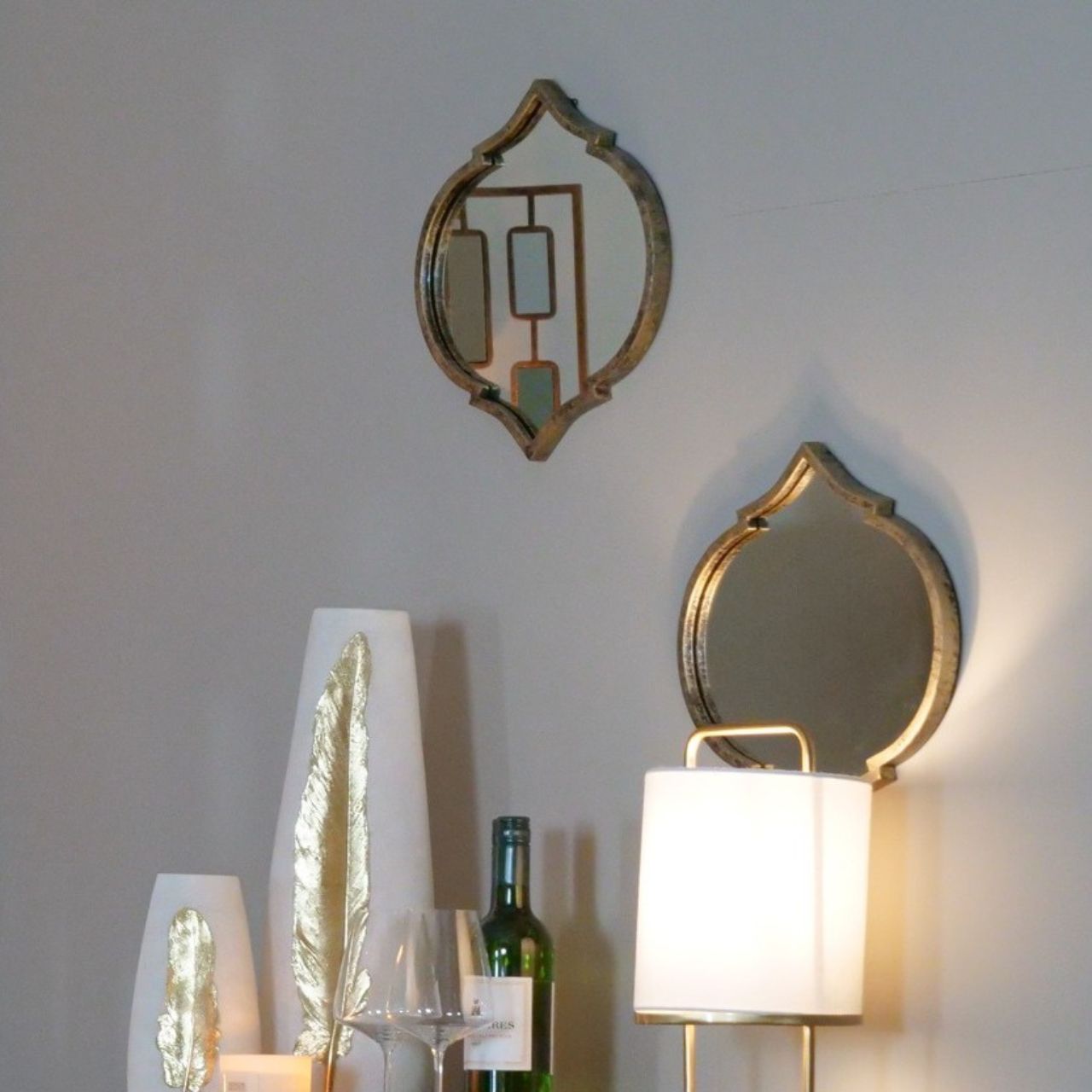 Mindy Brownes Elisha Mirror Inspired by the Moroccan Ogee. For those on the look out for a unique mirror to fill a small space. Ideal to hang three or four of these beauties beside one another. Antique gold in colour.