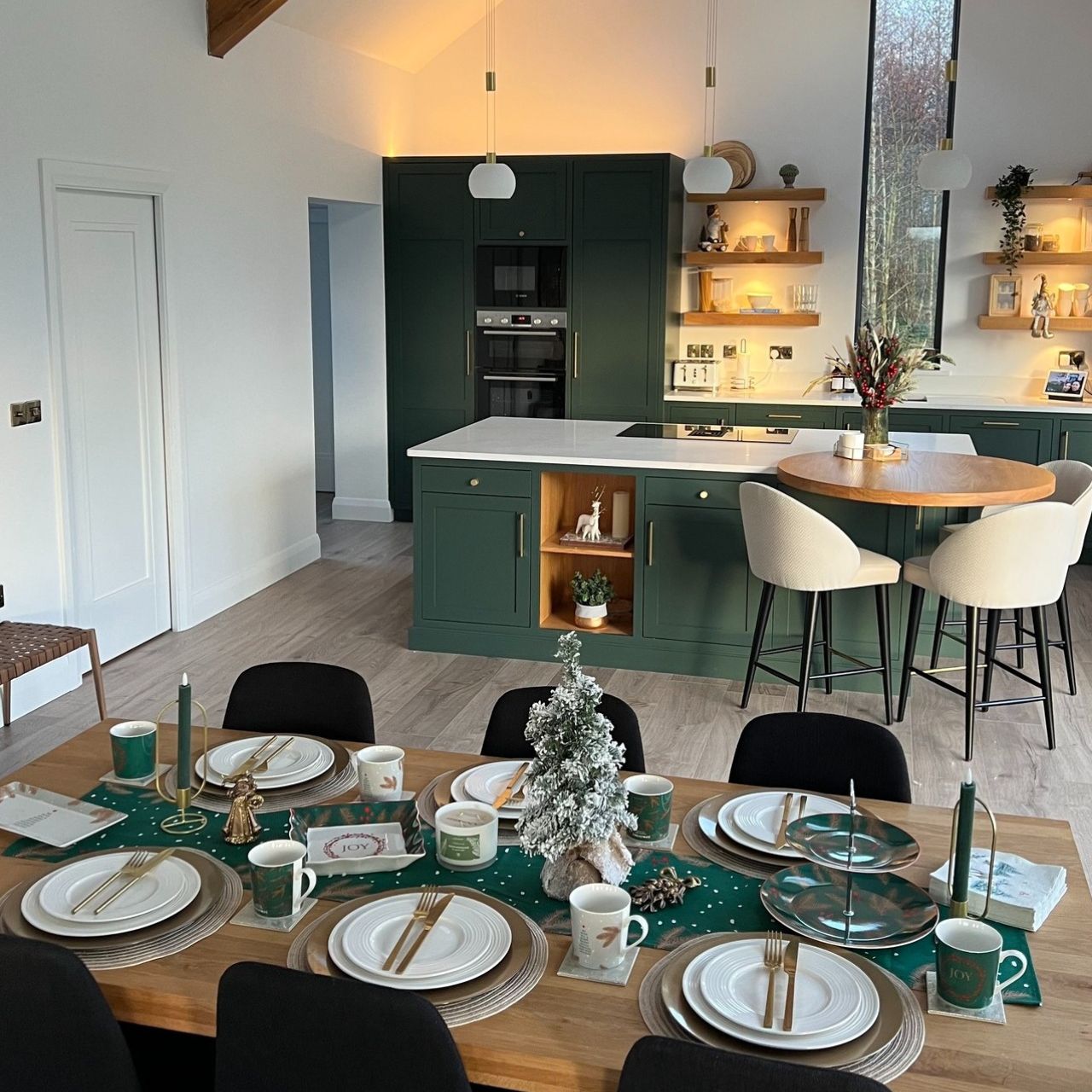 Christmas Festive Fir Two Tier Cake Stand by Mindy Brownes Interiors Introducing our Festive Fir collection. This charming collection is adorned with beautiful designs inspired by Christmas fir branches, red berries, and heart-warming holiday messages on green and white backgrounds.