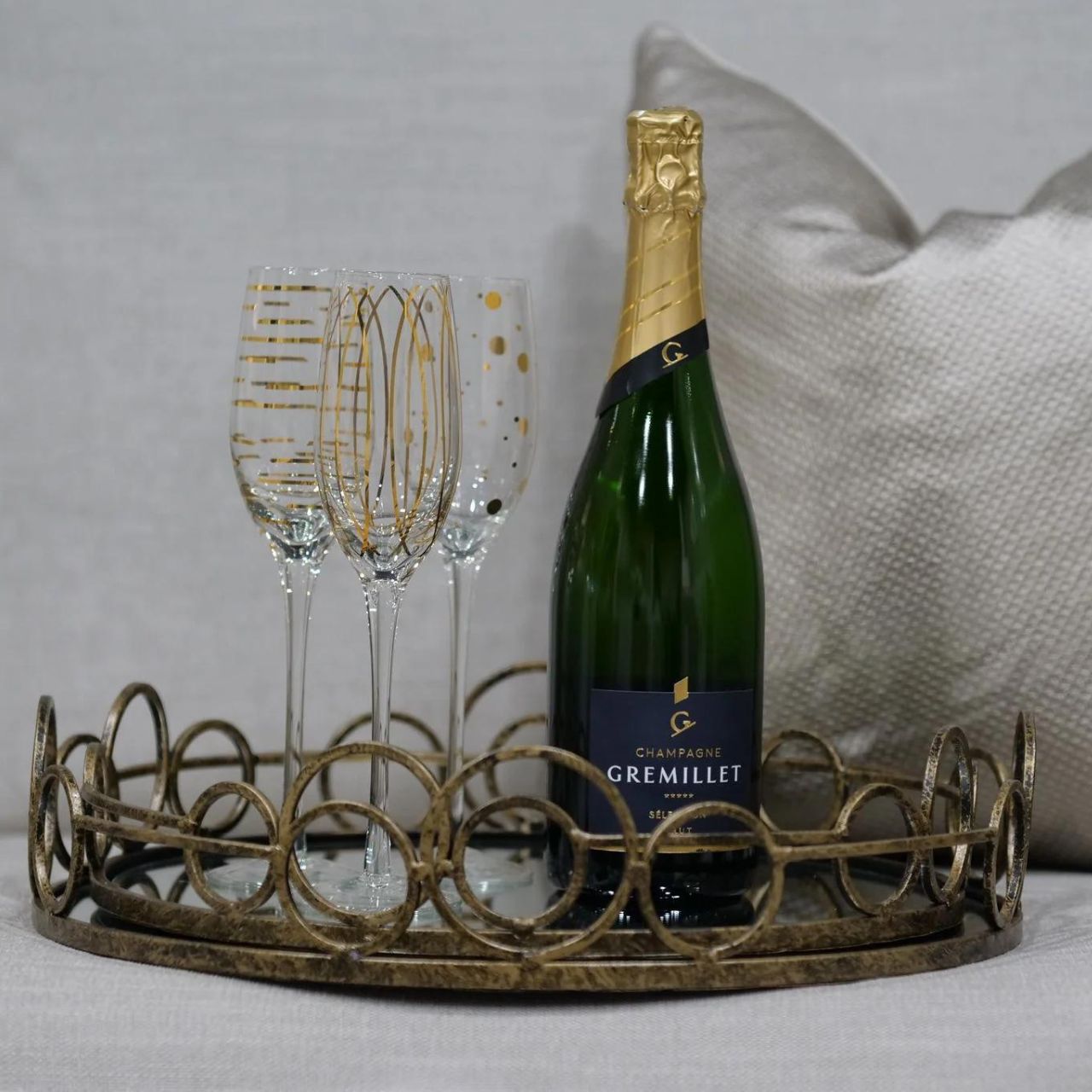 Mindy Brownes Remy Trays Set of 2 Set of two mirrored trays, Serve your drinks or nibbles in style on this deco mirror tray. Beautifully constructed from glass and metal, it's sure to make an impact. Antique gold in finish.
