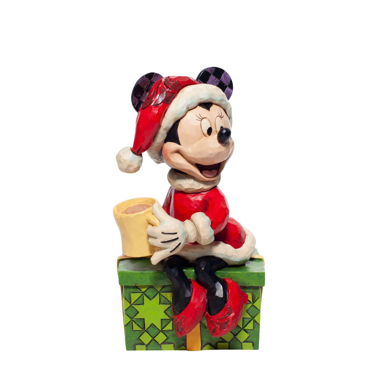 Disney Minnie Mouse with Hot Chocolate Figurine Dressed in a dainty Santa skirt and hat, Minnie soaks in the holiday spirit. Sipping from a cup of hot chocolate, this sweet mouse celebrates the most wonderful time of the year in style. Once again, Jim Shore captures the magic of Disney.