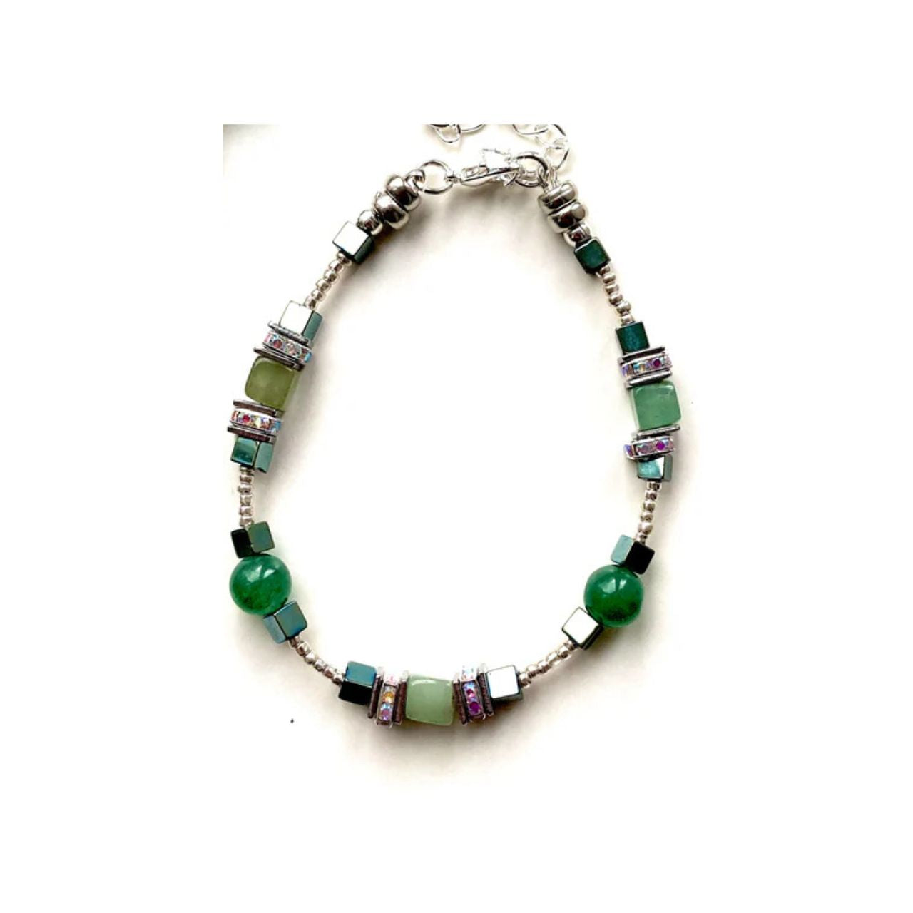 I love playing around with geometric shapes. Here I have combined cubes and spheres for a dynamic effect using Green Aventurine, Jade and Hematite gemstones interspersed with sparkling Rhinestone spacer beads, creating an easy to wear and flattering piece of jewellery.