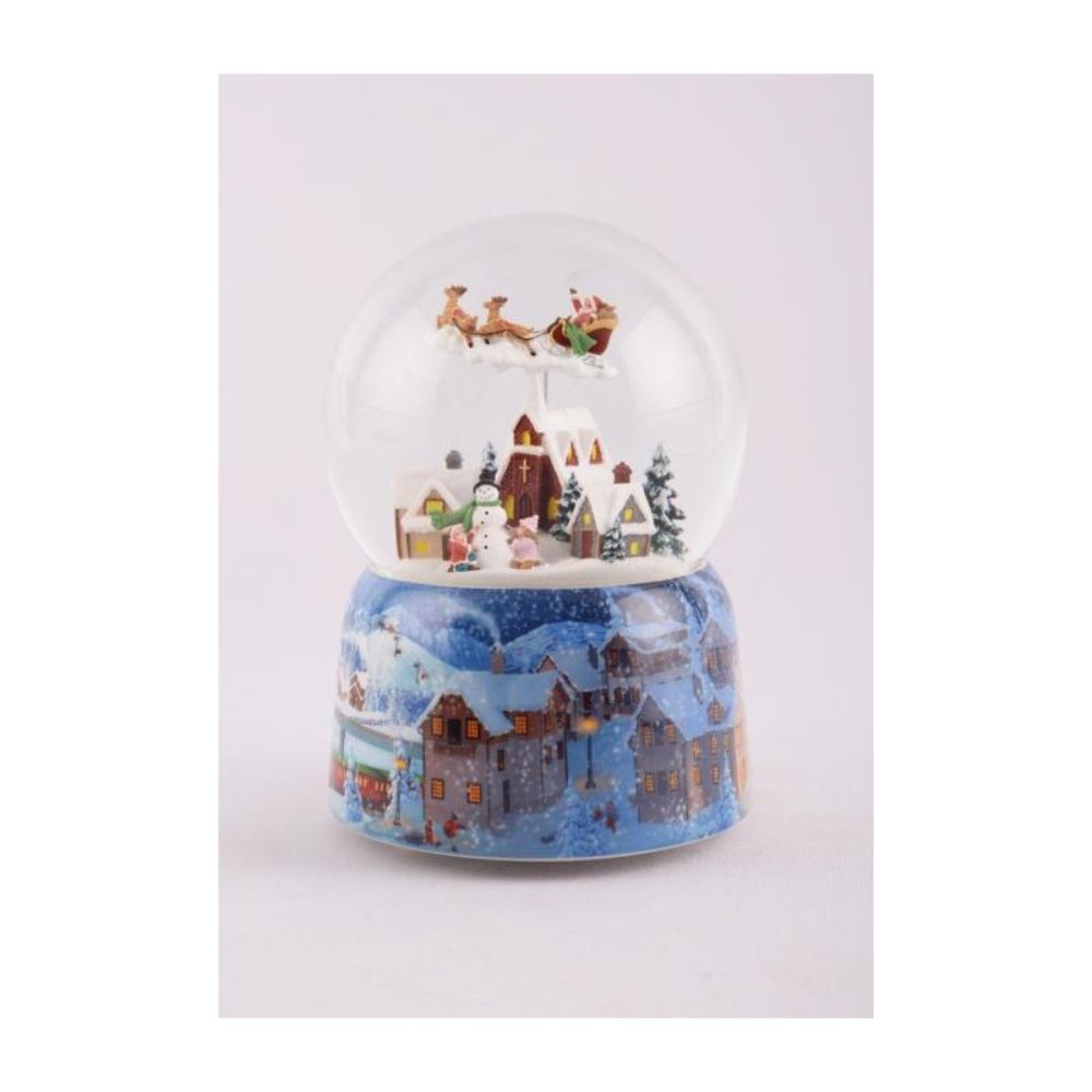Snow globe flying Santa 150 mm. The wind-up music plays a popular Christmas melody while Santa and his sleigh “fly” above the village.