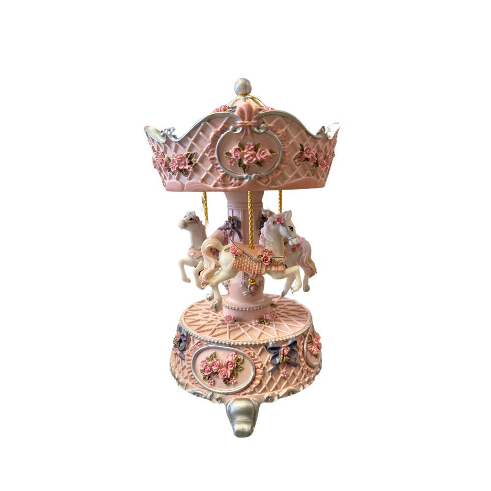Rose carousel decorated with rose roses and pink ribbon turns to the melody Bolero.