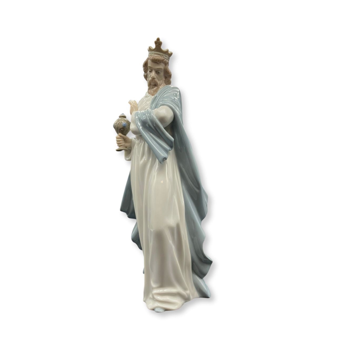 Nao by Lladro King Gaspar with Cup Wisemen Nao porcelain figurine “King Gaspar with Cup” from the Christmas Collection. Sculpted by Regino Torrijos, this figurine is part of the nativity set.