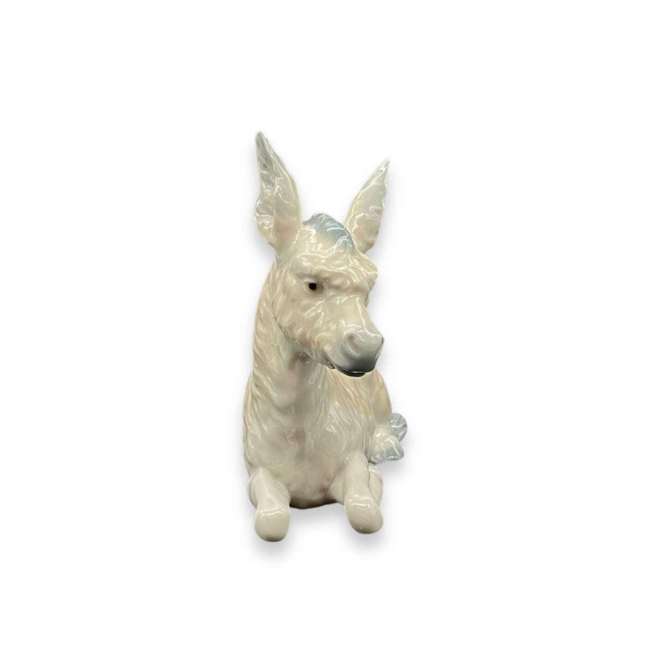 Nao by Lladro Nativity Donkey Nao porcelain figurine “Donkey” from the Christmas Collection. Sculpted by Salvador Furió, this figurine is part of the nativity set.